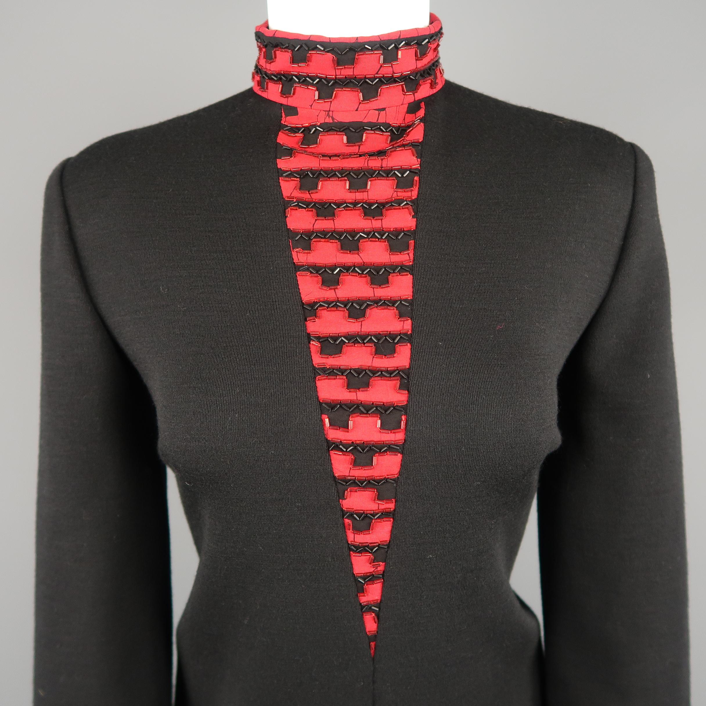 Vintage 1980's BOB MACKIE dress comes in black jersey knit with a shift silhouette, red beaded stand up collar with V panel and layered sleeves with red cuffs. Made in USA.
 
Good Pre-Owned Condition.
Marked: (no size)
 
Measurements:
 
Shoulder: 16