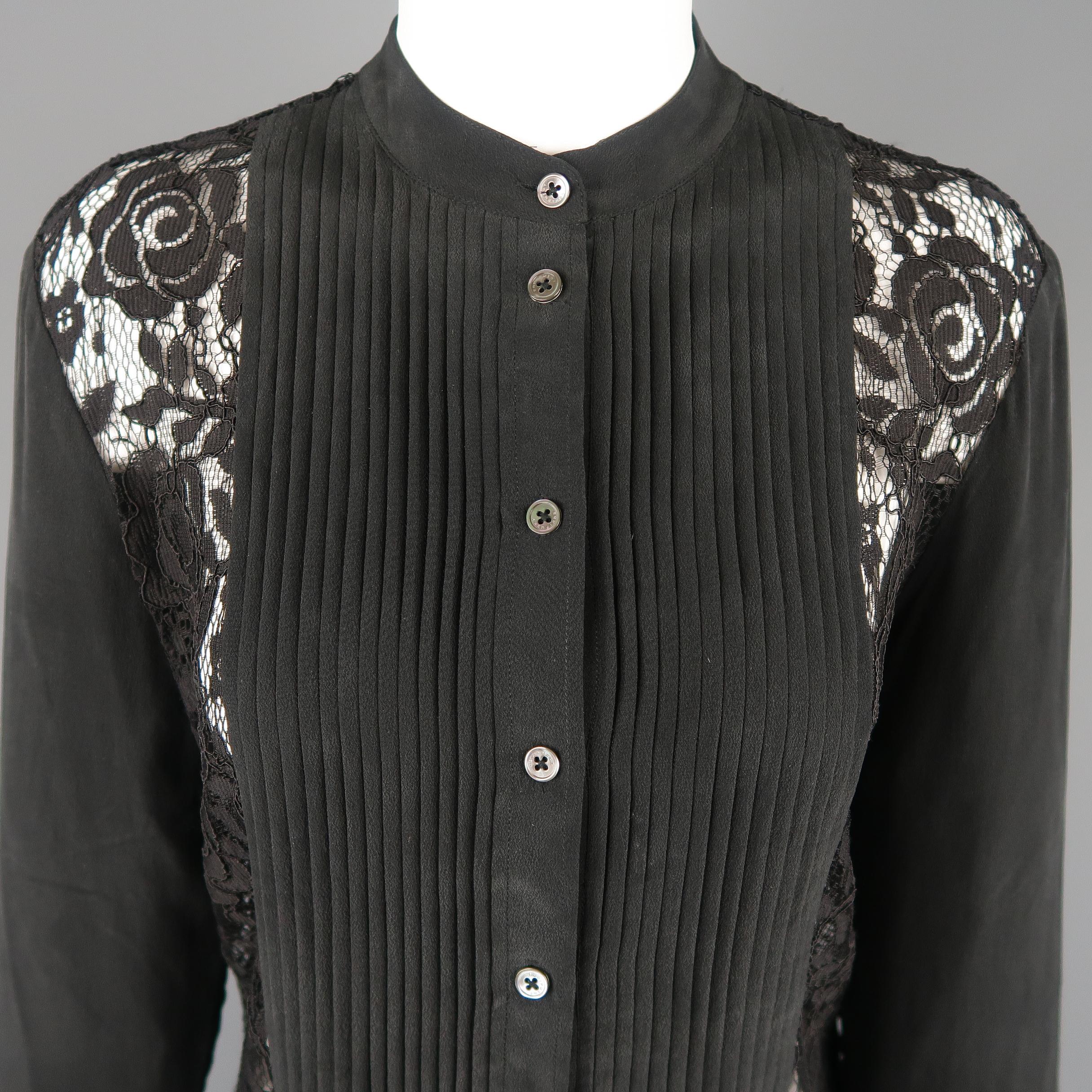 EQUIPMENT FEMME dress shirt comes in black rose lace with a band collar, button up front, silk sleeves, and silk pleated tuxedo bib panel.
 
Excellent Pre-Owned Condition.
Marked: XS
 
Measurements:
 
Shoulder: 16 in.
Bust: 40 in.
Sleeve: 23