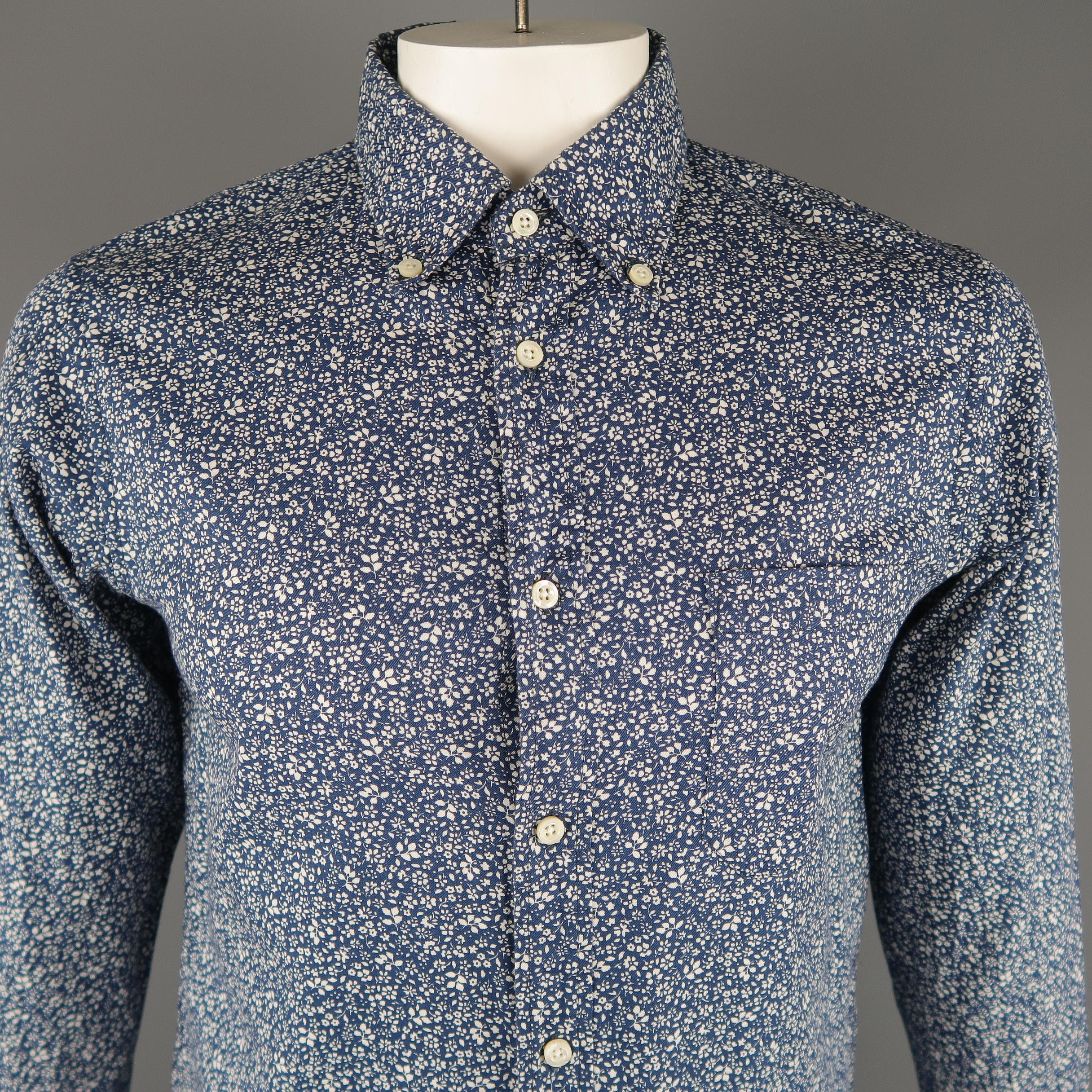 TS (S) long sleeve shirt come in navy floral cotton fabric, button down and with a front pocket. Made in Japan.
 
Excellent Pre-Owned Condition.
Marked: 4
 
Measurements:
 
Shoulder: 17  in.
Chest: 44  in.
Sleeve: 25.5  in.
Length: 29.5  in.