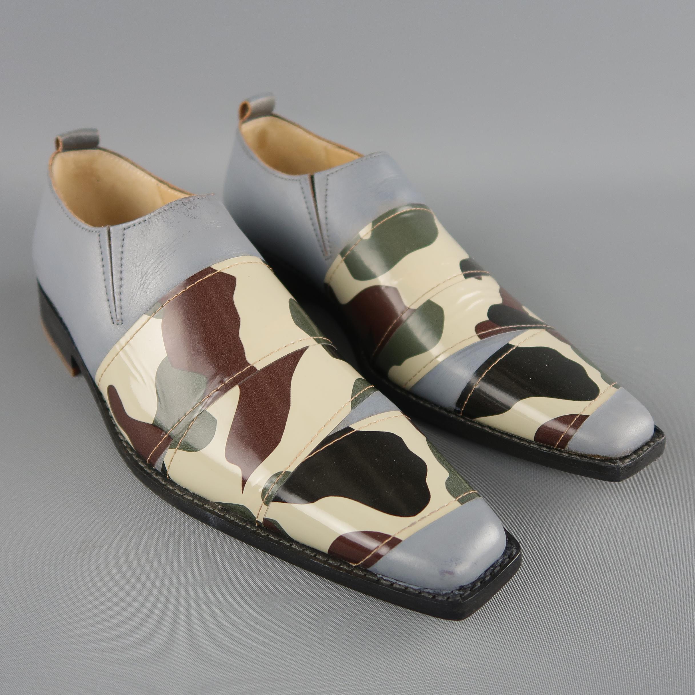 COMME des GARCONS Homme Plus loafers dress shoes come in gray leather with a squared pointed toe, black heeled sole, an camouflage patent leather strap applique. New with Box. A couple scuffs from storage. Made in Japan.
 
New With Box.
Marked: 24

