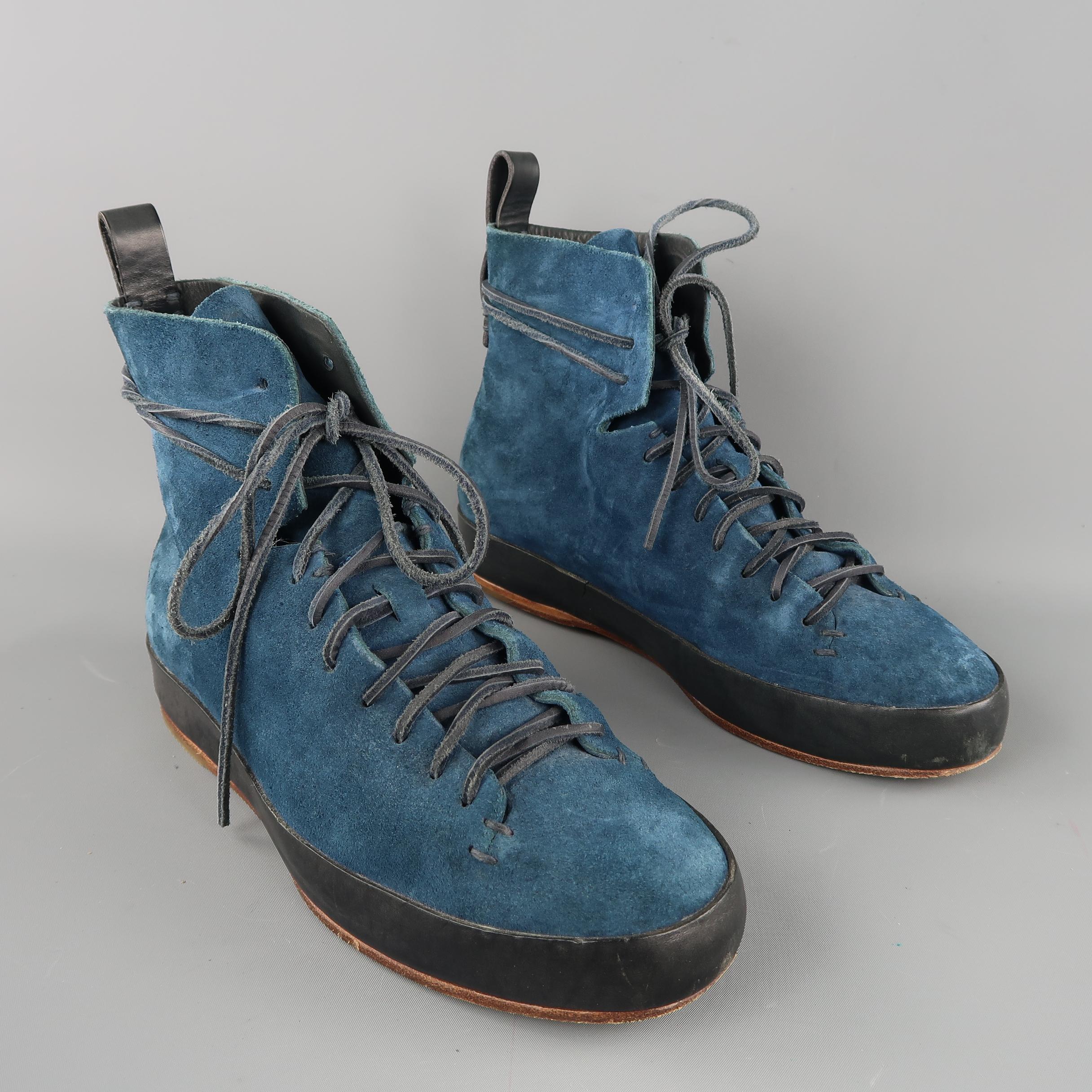 FEIT boots are in blue solid suede, featuring black leather detail on the back, lace up. Minor wear.
 
Excellent  Pre-Owned Condition
Marked: 43
 
Measurements:
Outsole: 11.5 x 2.5 in.