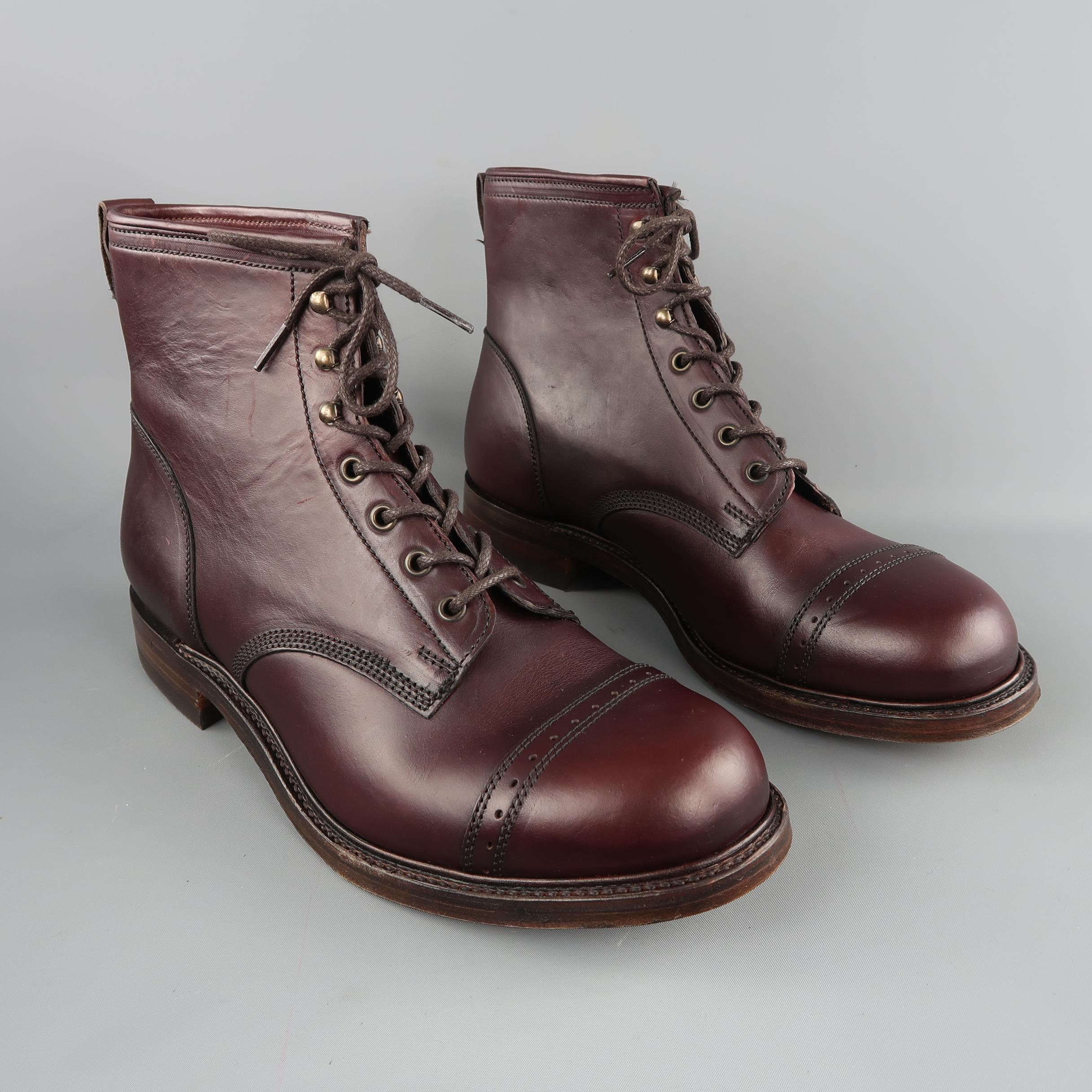 RRL by RALPH LAUREN ankle boots are in burgungy solid leather, with cap toe, lace up.  Made in England.
 
New with box.
Marked: 11.5 UK
 
Measurements:
Outsole: 12.5 x 3  in.
