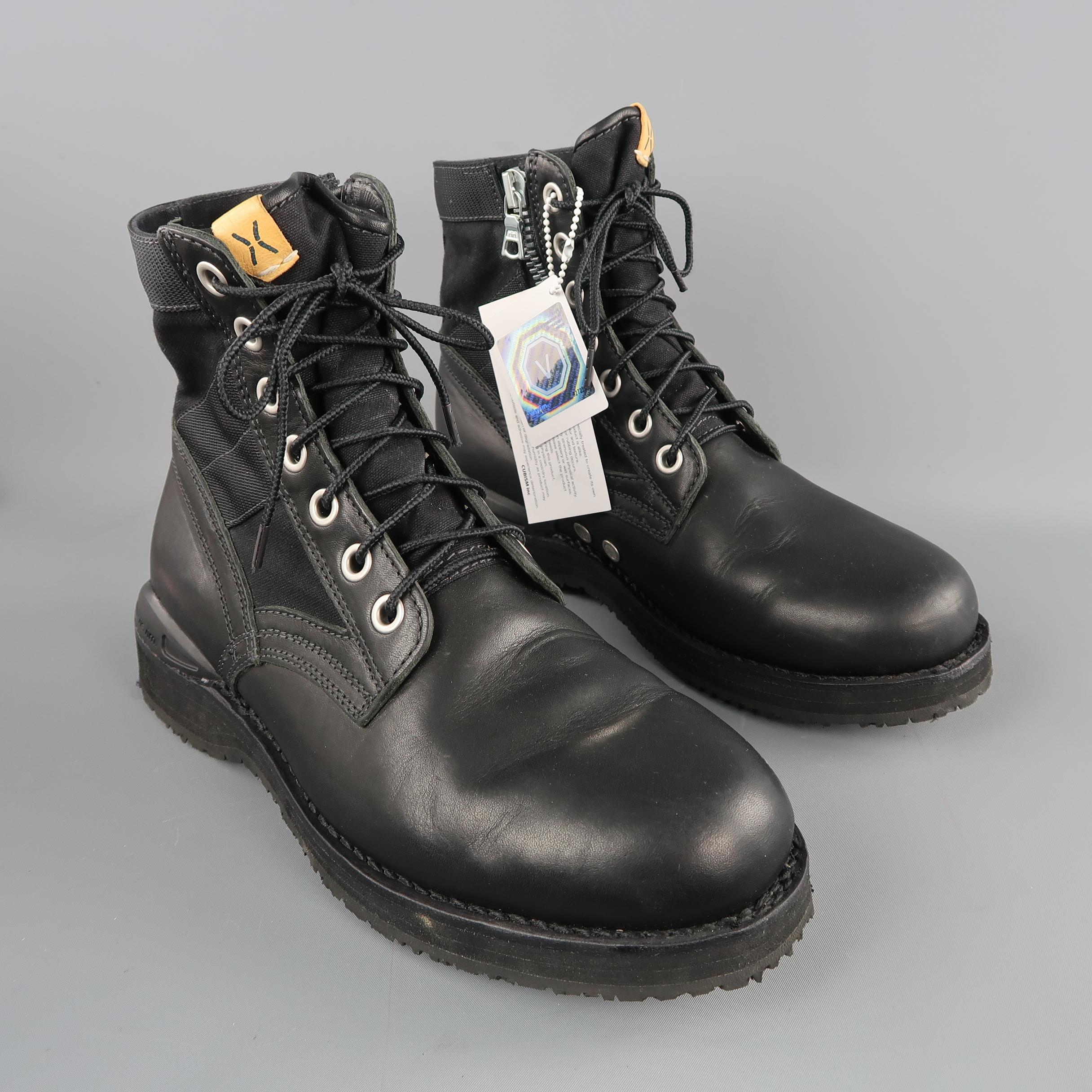 VISVIM ankle boots are in black solid leather, lace up, with zipper and trim details. With box.  Retails: $1200
 
New with tags.
Marked: 9
 
Measurements:
Outsole: 12  x 3  in.
