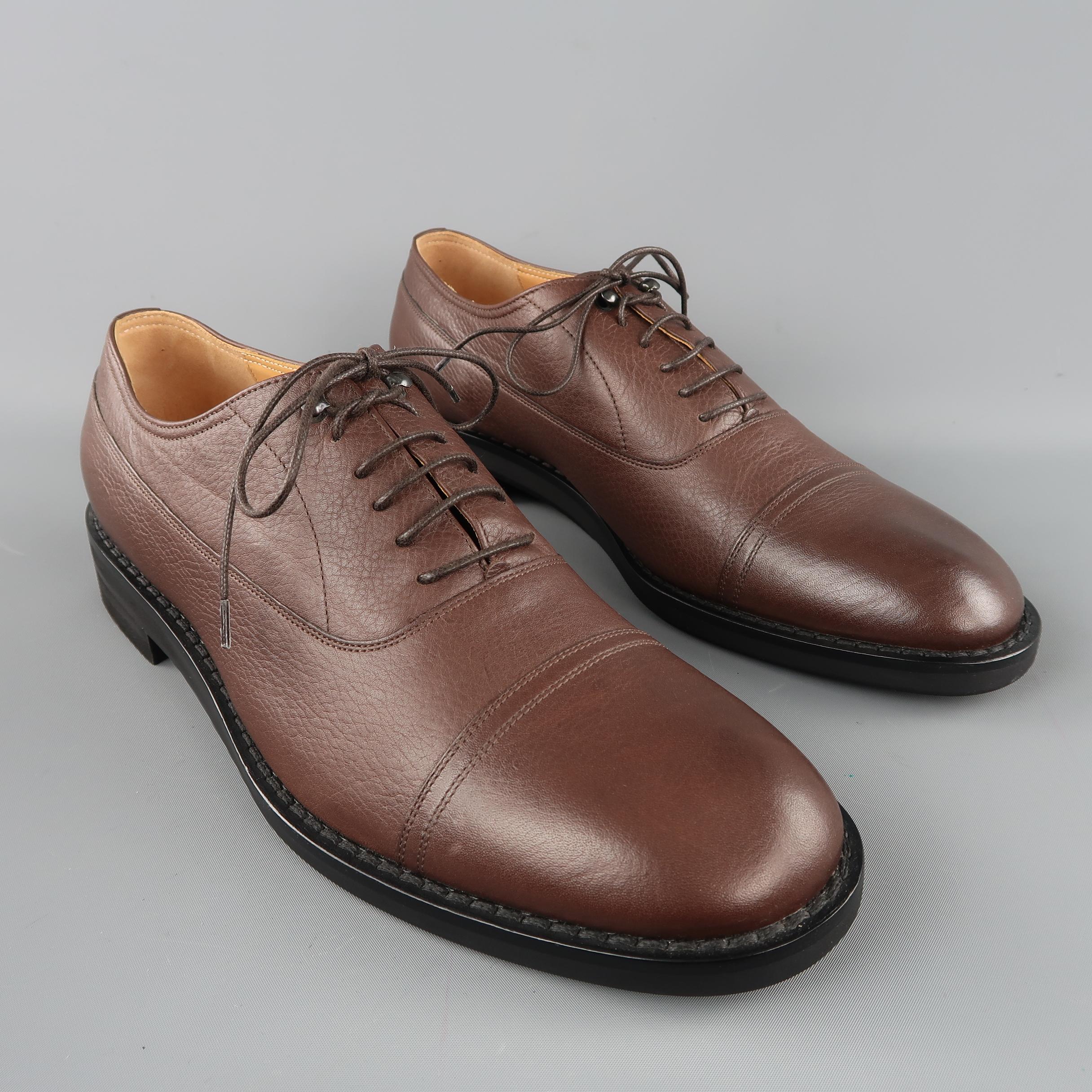 MAISON MARTIN MARGIELA shoe come in brown solid leather, with cap toe, lace up. Made in Italy.  Retails: $740
 
New with Box.
Marked: 45 IT
 
Measurements:
Outsole: 13 x 3  in.