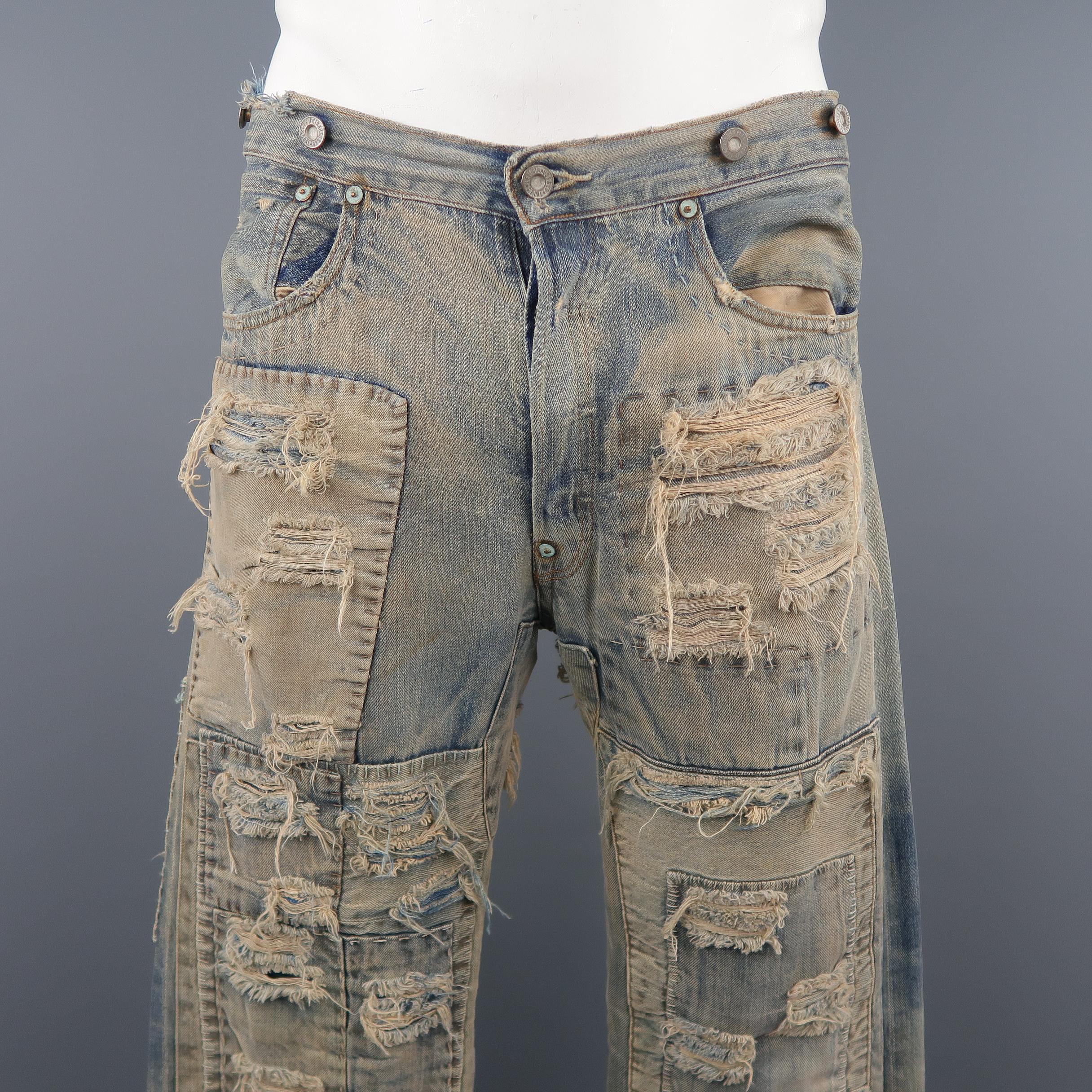 LEVI' S VINTAGE jeans come in light dirty washed denim with all over patchwork and destroyed distressing details. Tear in back. As-is. Made in USA.
 
Good Pre-Owned Condition.
Marked: (no size)
 
Measurements:
 
Waist: 34 in.
Rise: 12 in.
Inseam: 36