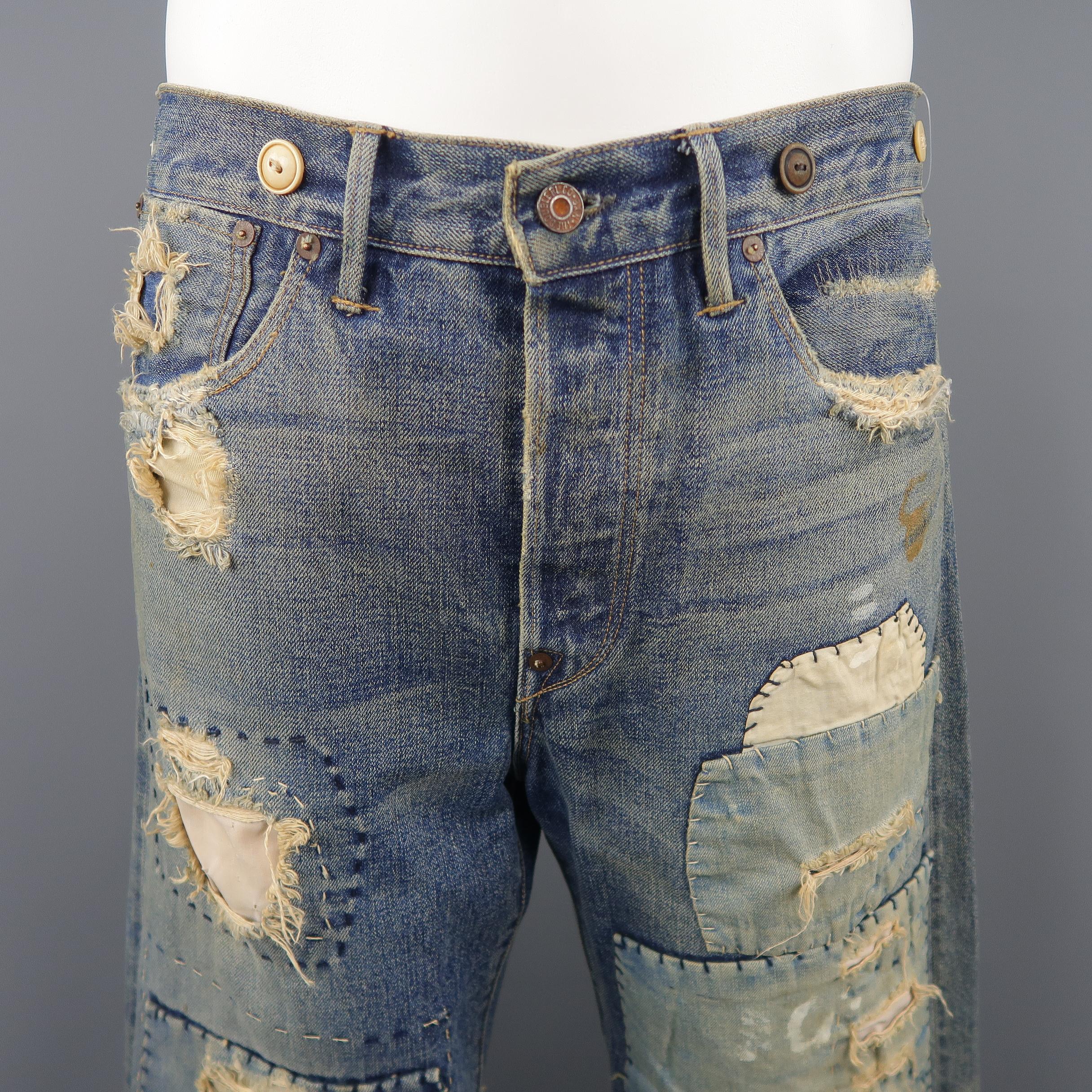 RRL by RALPH LAUREN Jeans im Vintage-Stil aus indigoblauem Denim mit Knöpfen:: Patchwork-Details:: Knopfleiste und Gürtel hinten. 

Hergestellt in den USA. 
Ausgezeichneter gebrauchter Zustand. 
Markiert: 32 x 34
 
Maße: 
 
Taille:  35 in.