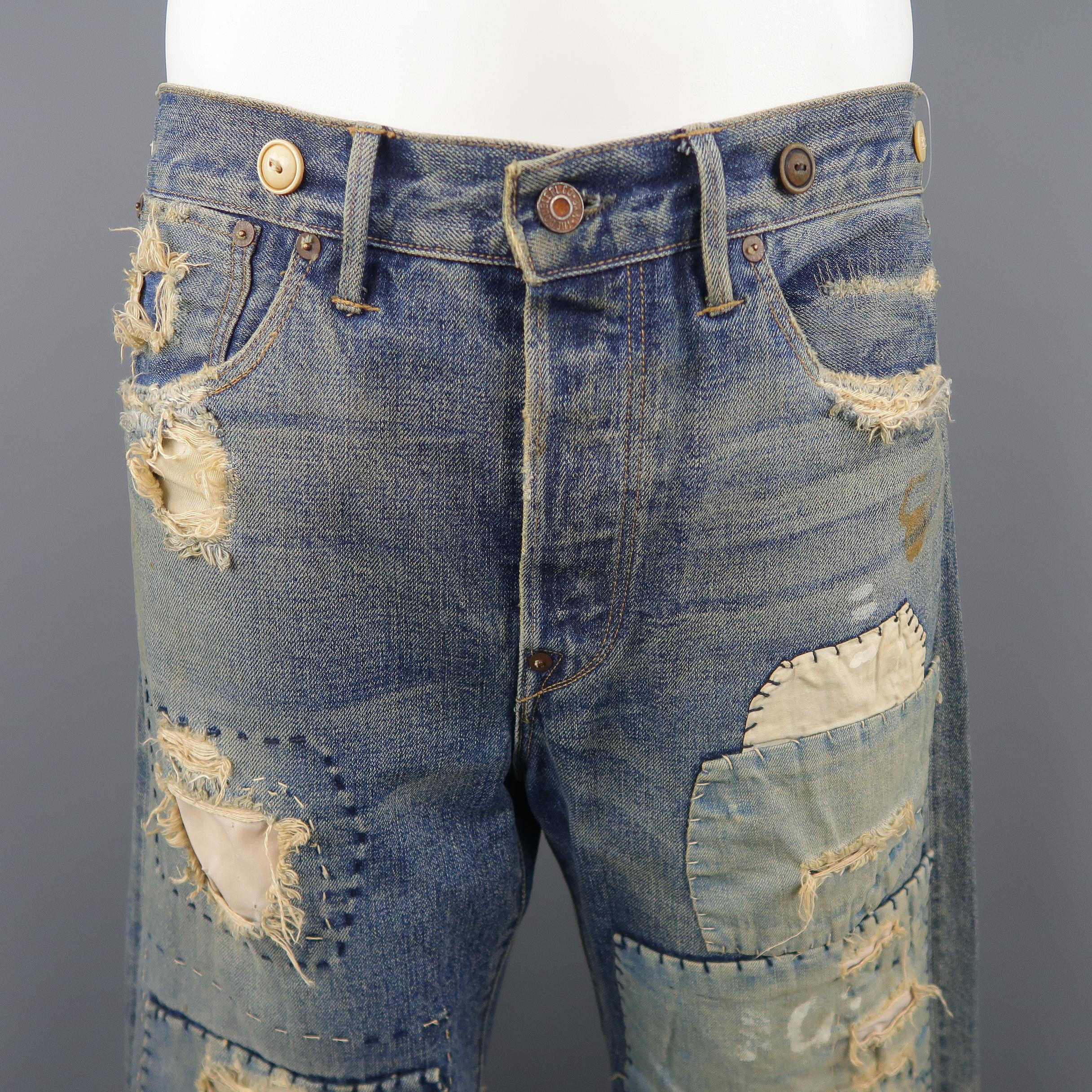 RRL by RALPH LAUREN vintage style distressed jeans come in indigo selvedge denim material, with buttons, patchwork details, button fly and back belt. 

Made in USA. 
Excellent  Pre-Owned Condition.
Marked: 32 x 34
 
Measurements:
 
Waist:  35 