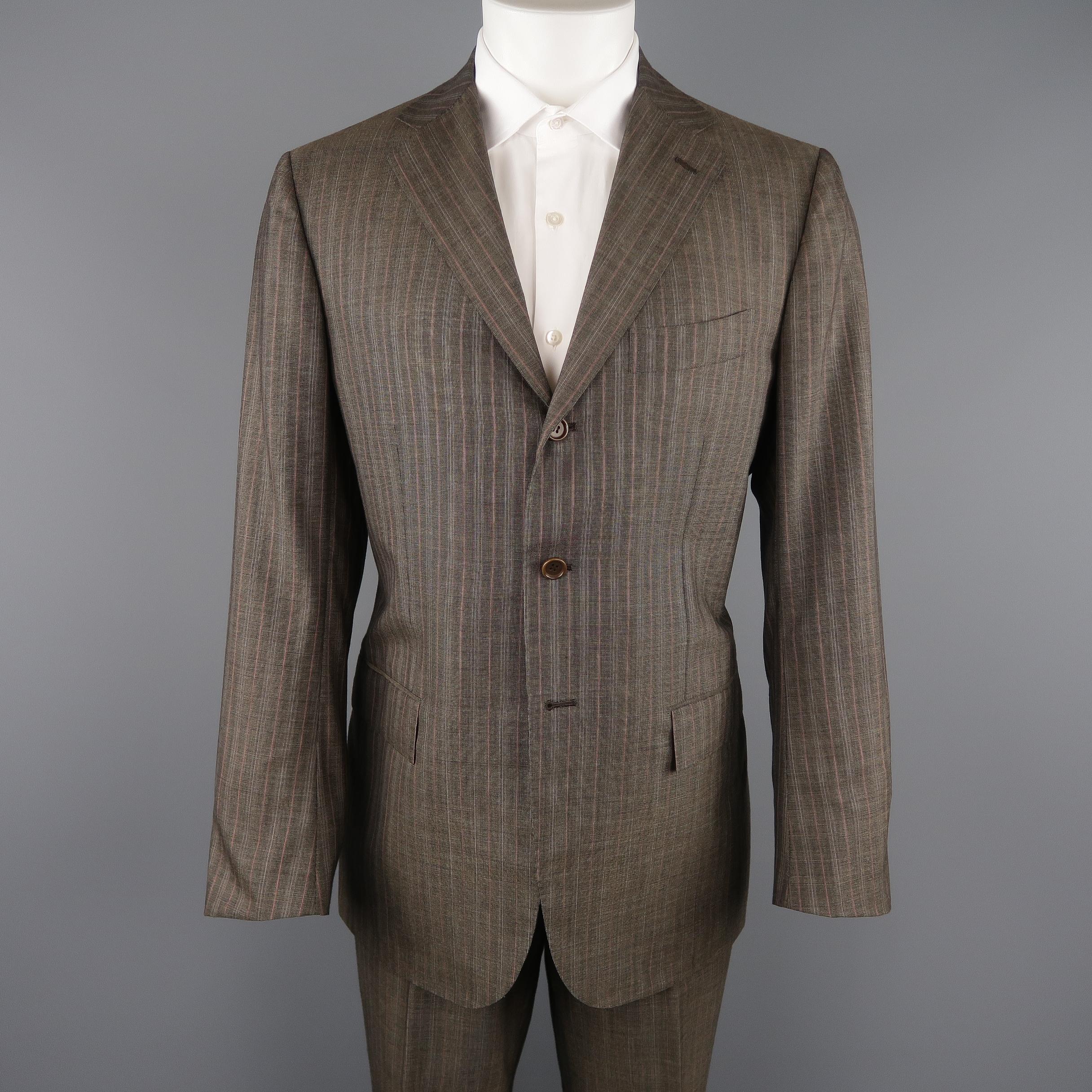 KITON two piece suit comes in brown Nailhead cashmere with an all over orange and beige pinstripe and includes a single breasted, three button, notch lapel sport coat  and matching flat front, cuffed trousers. 

Made in Italy. 
Excellent Pre-Owned