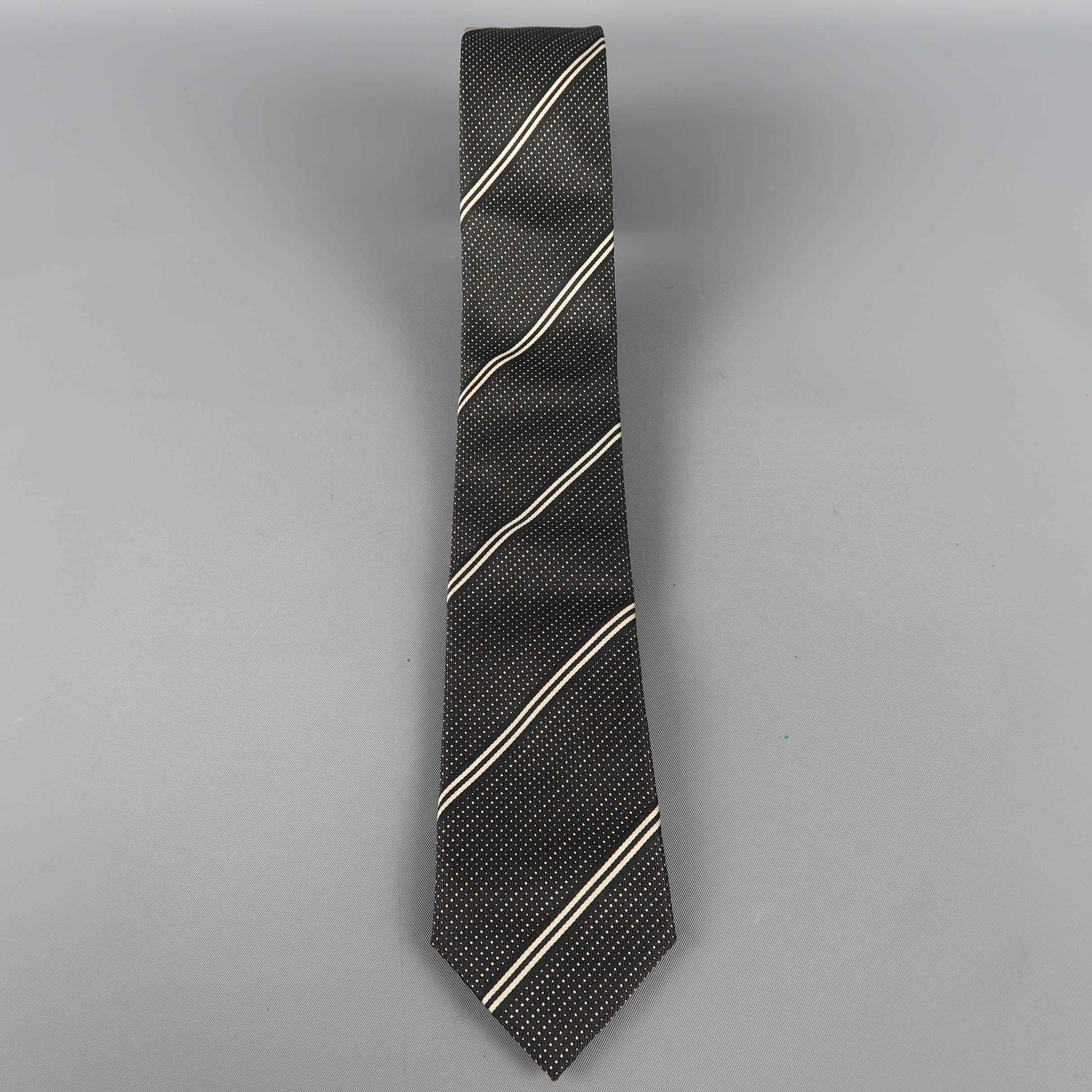 PRADA tie come in black silk  with diagonal silver stripes and dots. Made in Italy.
 
Excellent Pre-Owned Condition.
 
Width: 2.5 in.