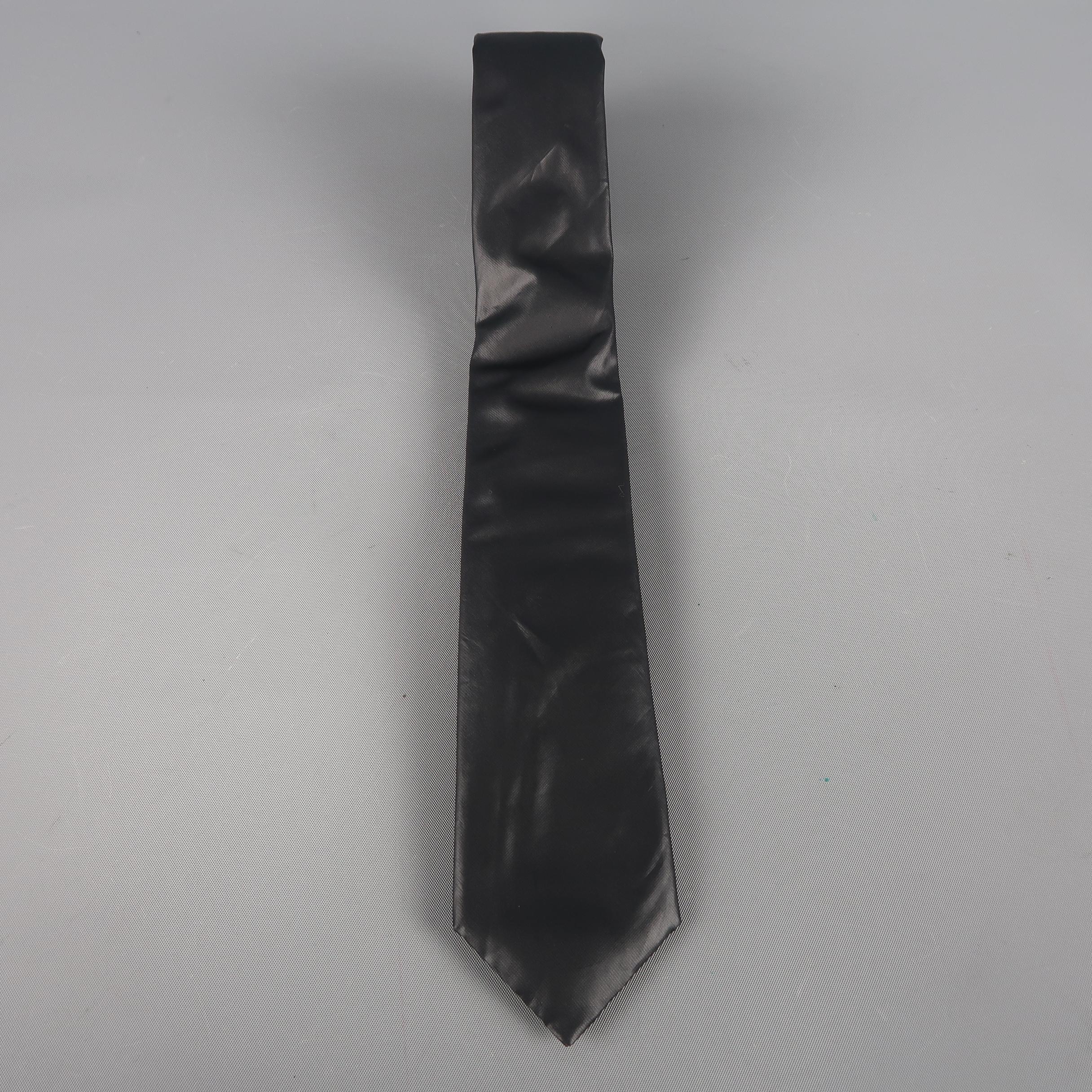 JIL SANDER  tie come in black solid polyester. Made in Italy.
 
Excellent Pre-Owned Condition.
 
Width: 2.5 in.