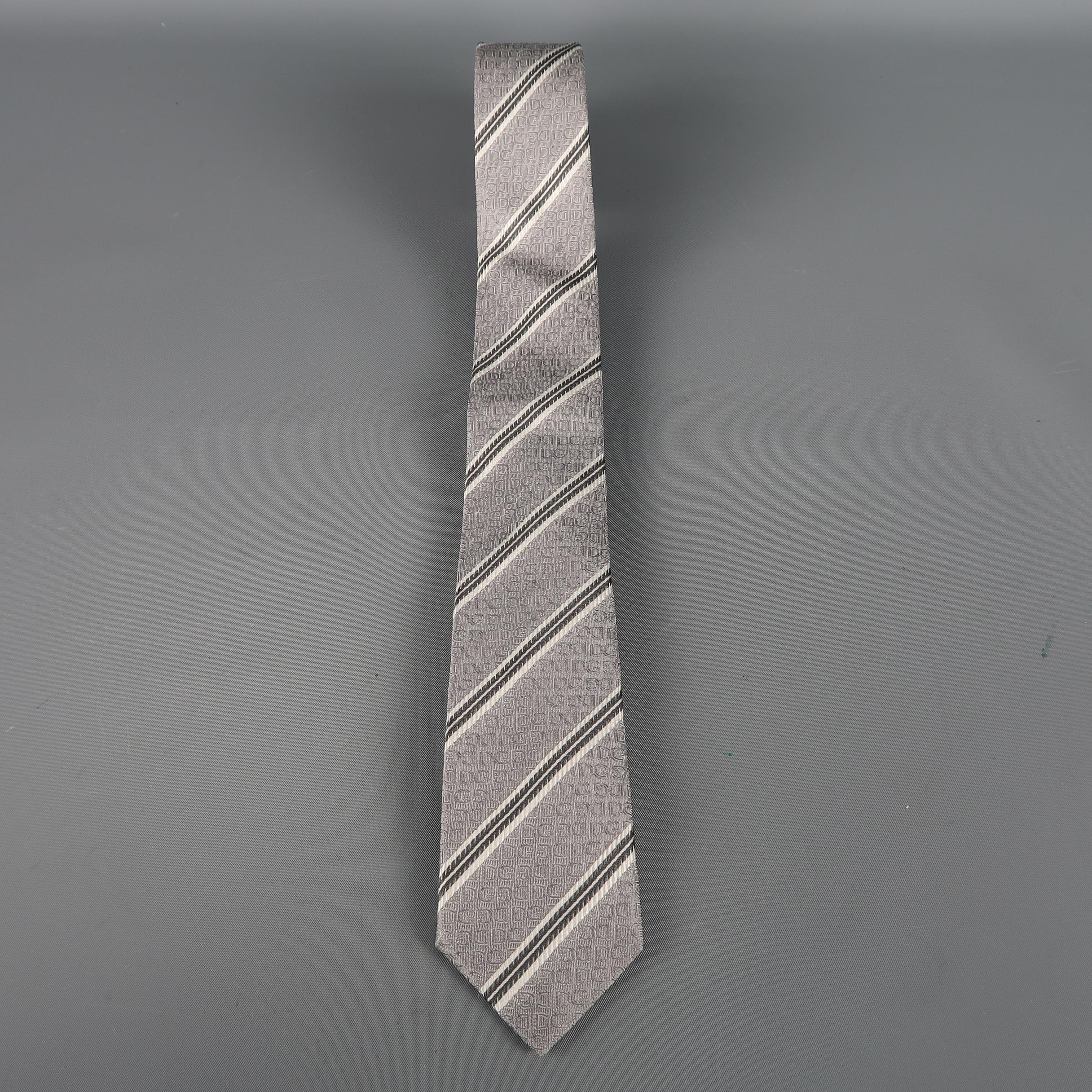 DOLCE & GABBANA skinny tie come in silver silk  with all over woven 