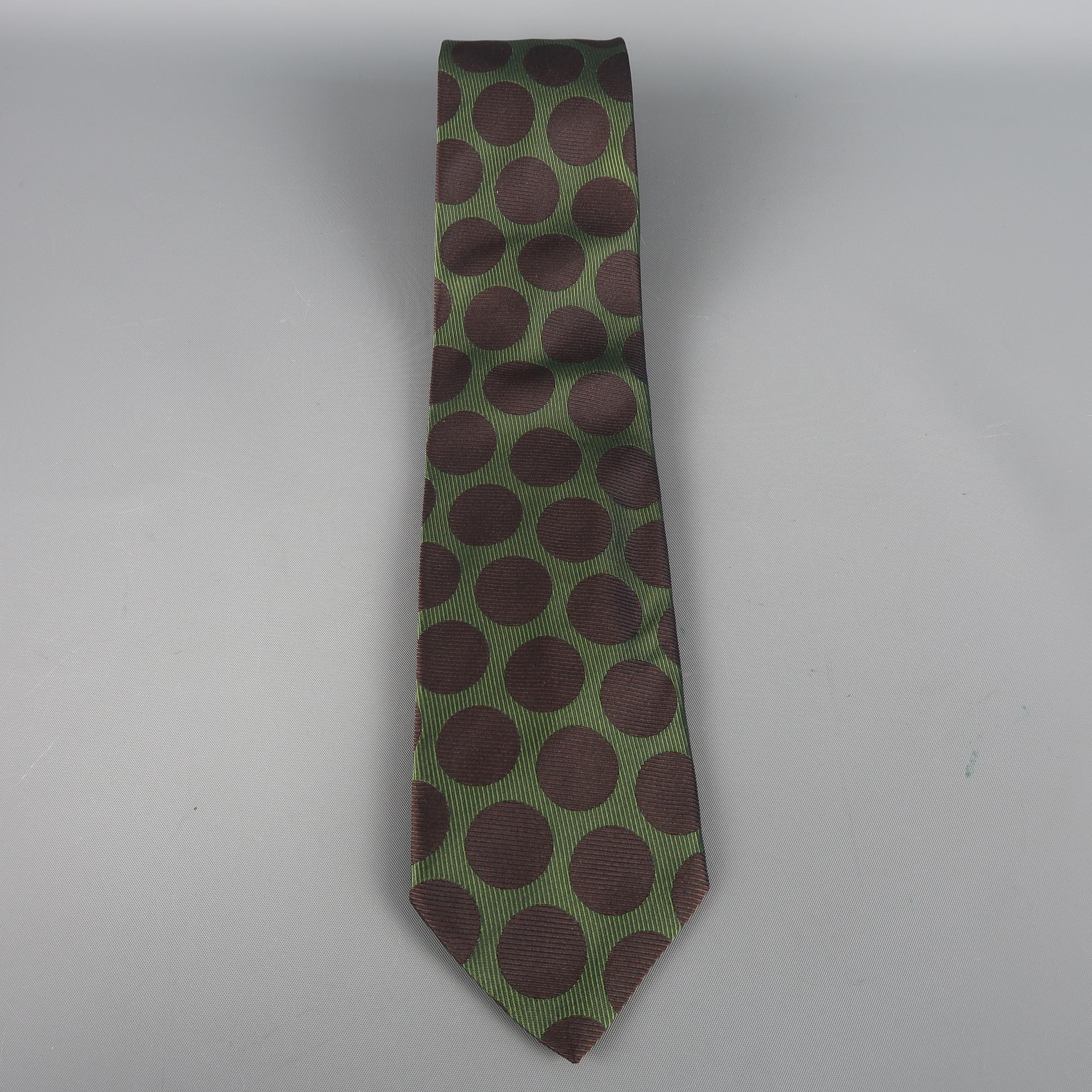 CHARVET tie come in olive and brown silk  with all over woven polka dots. Made in France.
 
Excellent Pre-Owned Condition.
 
Width: 3.5 in.