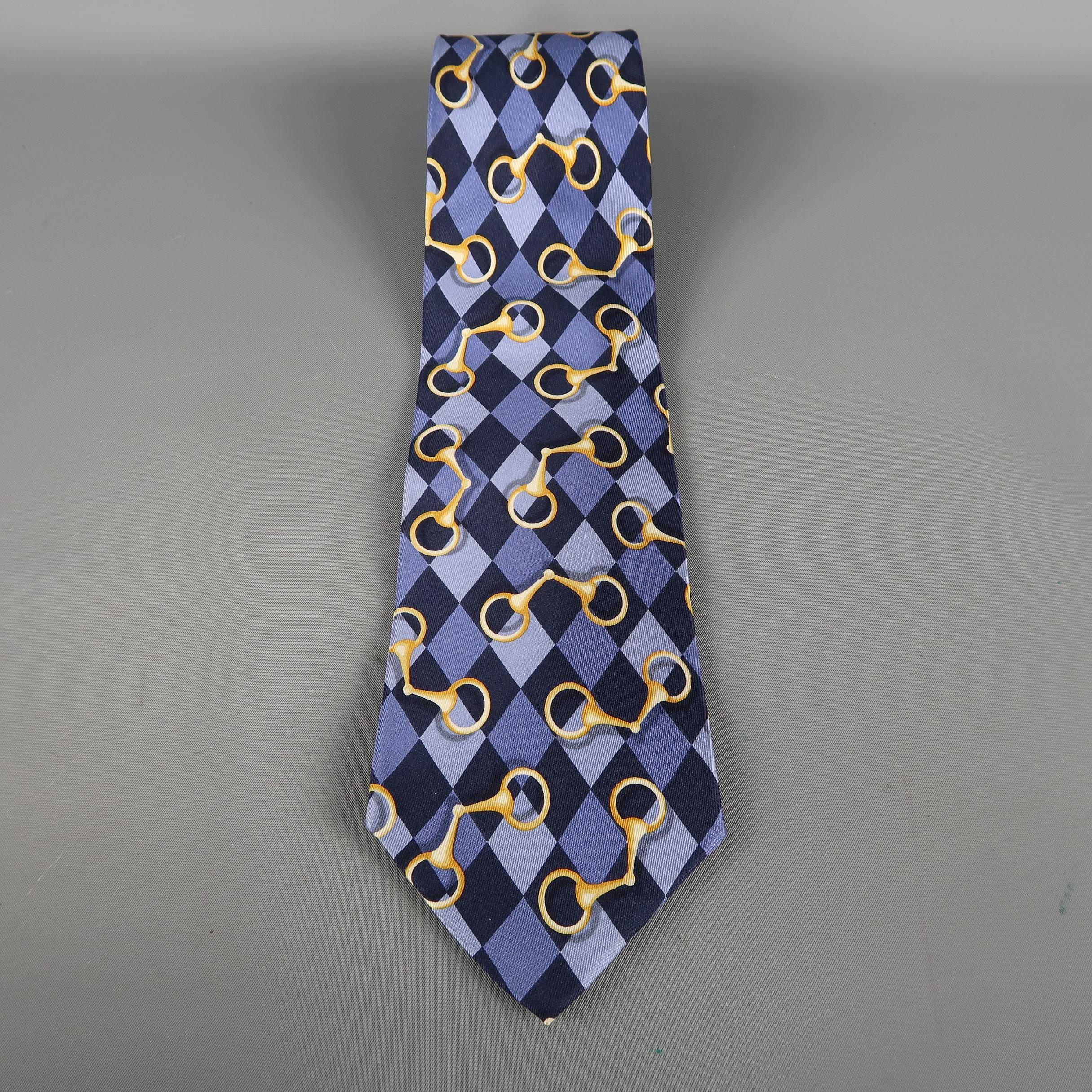 GUCCI tie come in purple silk  with an all over rhombus print. Made in Italy.
 
Excellent Pre-Owned Condition.
 
Width: 4 in.