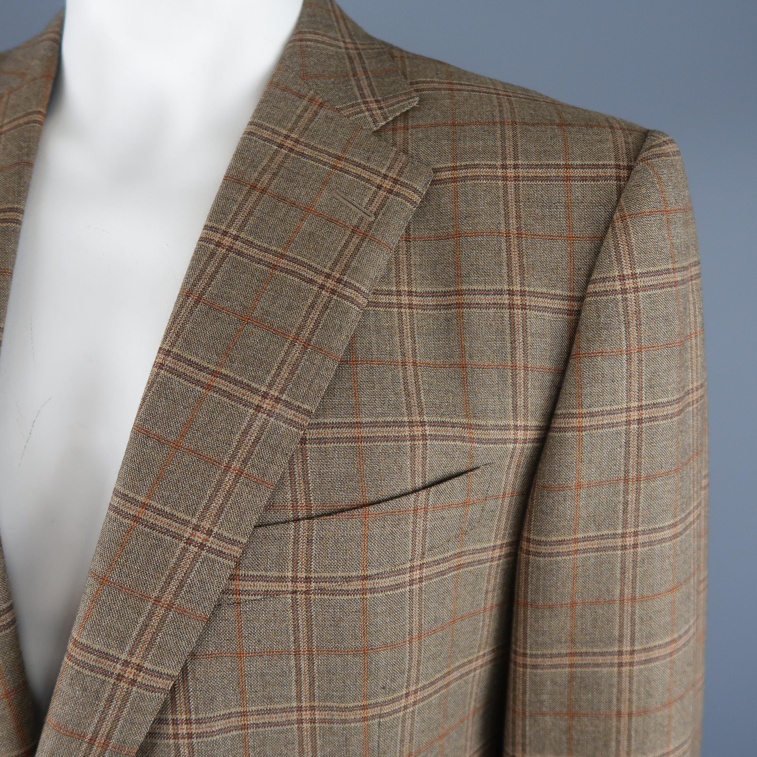 ERMENEGILDO ZEGNA sport coat comes in taupe and orange plaid windowpane plaid wool with a notch lapel, two button single breasted closure, and flap pockets. Made in Italy.
 
Excellent Pre-Owned Condition.
Marked: IT 58 L
 
Measurements:
 
Shoulder: