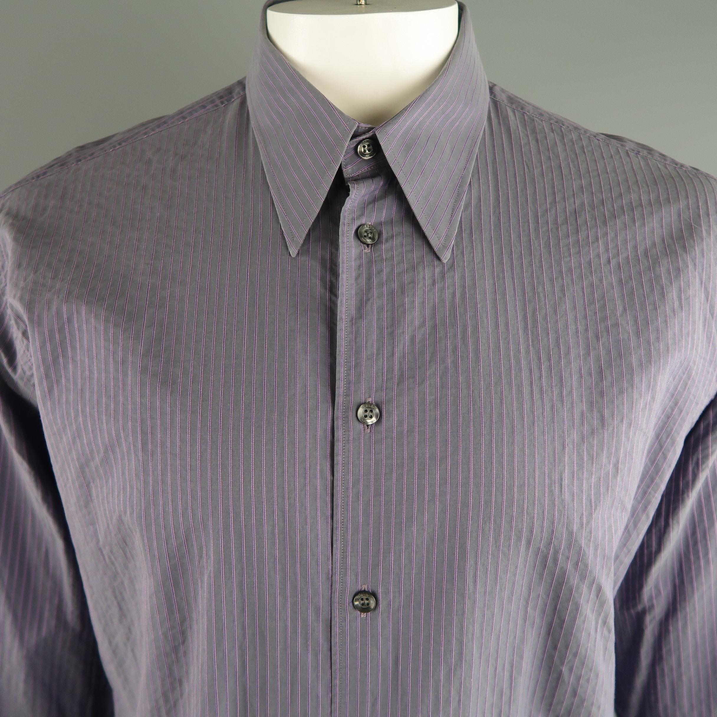 VERSACE COLLECTION fitted long sleeve shirt comes in lavender tone in a striped cotton material, button up. Minor wear.
 
Excellent Pre-Owned Condition.
Marked: 17/43
 
Measurements:
 
Shoulder: 19  in.
Chest: 49  in.
Sleeve: 27.5  in.
Length:  32 
