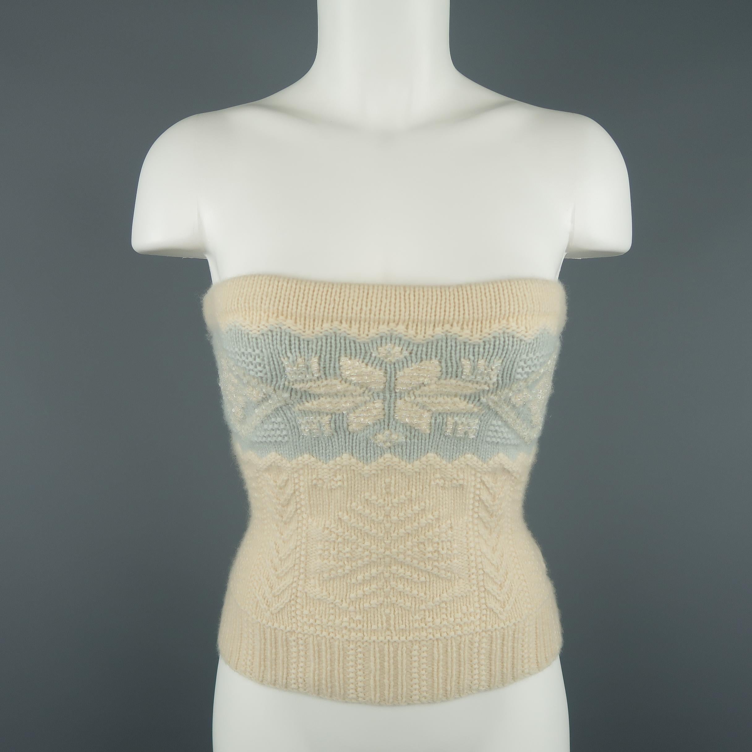 RALPH LAUREN BLACK LABEL strapless tube top comes in a cream beige textured knit with a blue beaded snowflake stripe motif.
 
Excellent Pre-Owned Condition.
Marked: M
 
Measurements:
 
Bust: 32 in.
Waist: 28 in.
Length: 13 in.