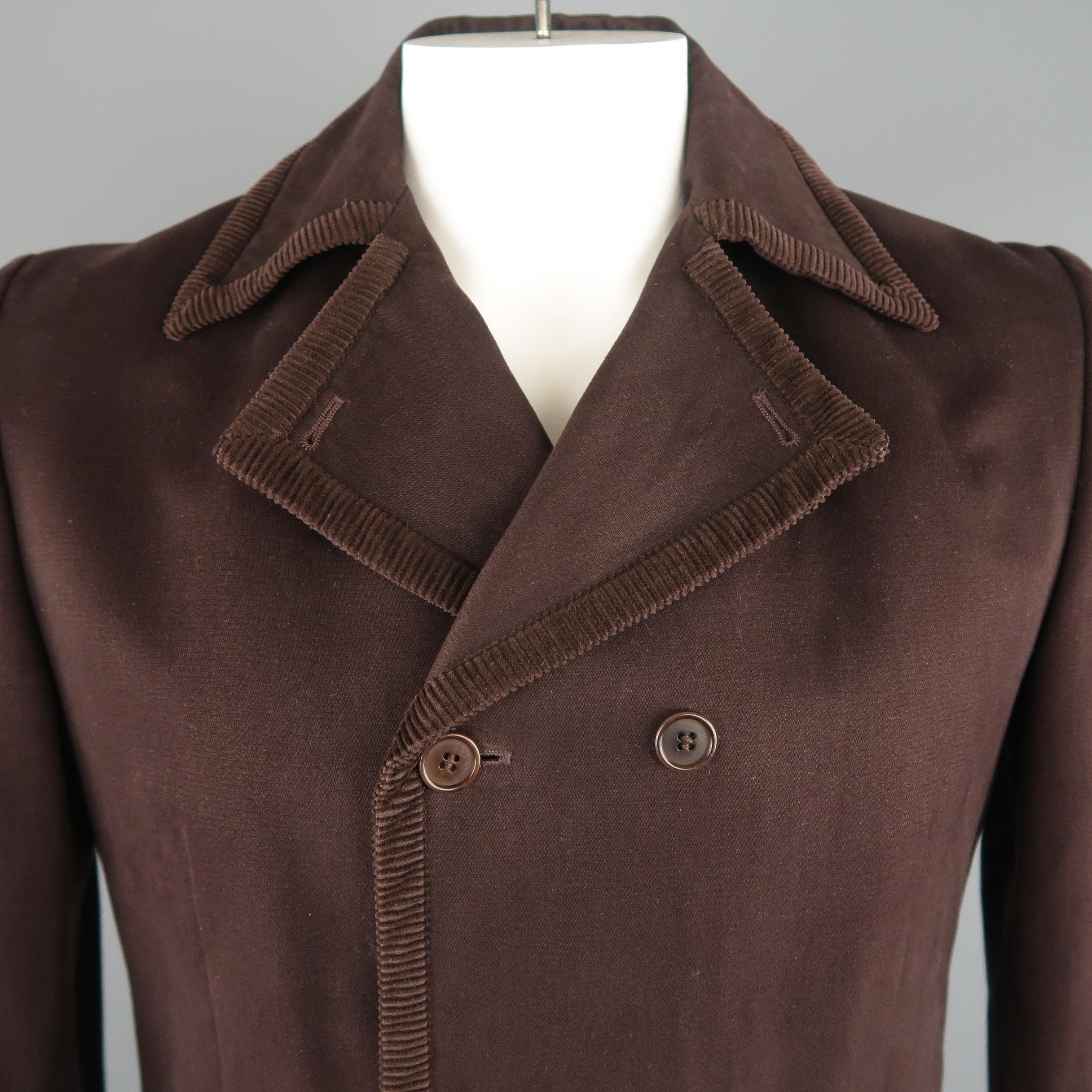 GIGLI coat comes in brown solid cotton material, double breasted, with a notch lapel, corduroy trim and slit pockets at front. Minor wear. Made in Italy.
 
Excellent Pre-Owned Condition.
Marked: 50IT
 
Measurements:
 
Shoulder:  16.5  in.
Chest: 45 