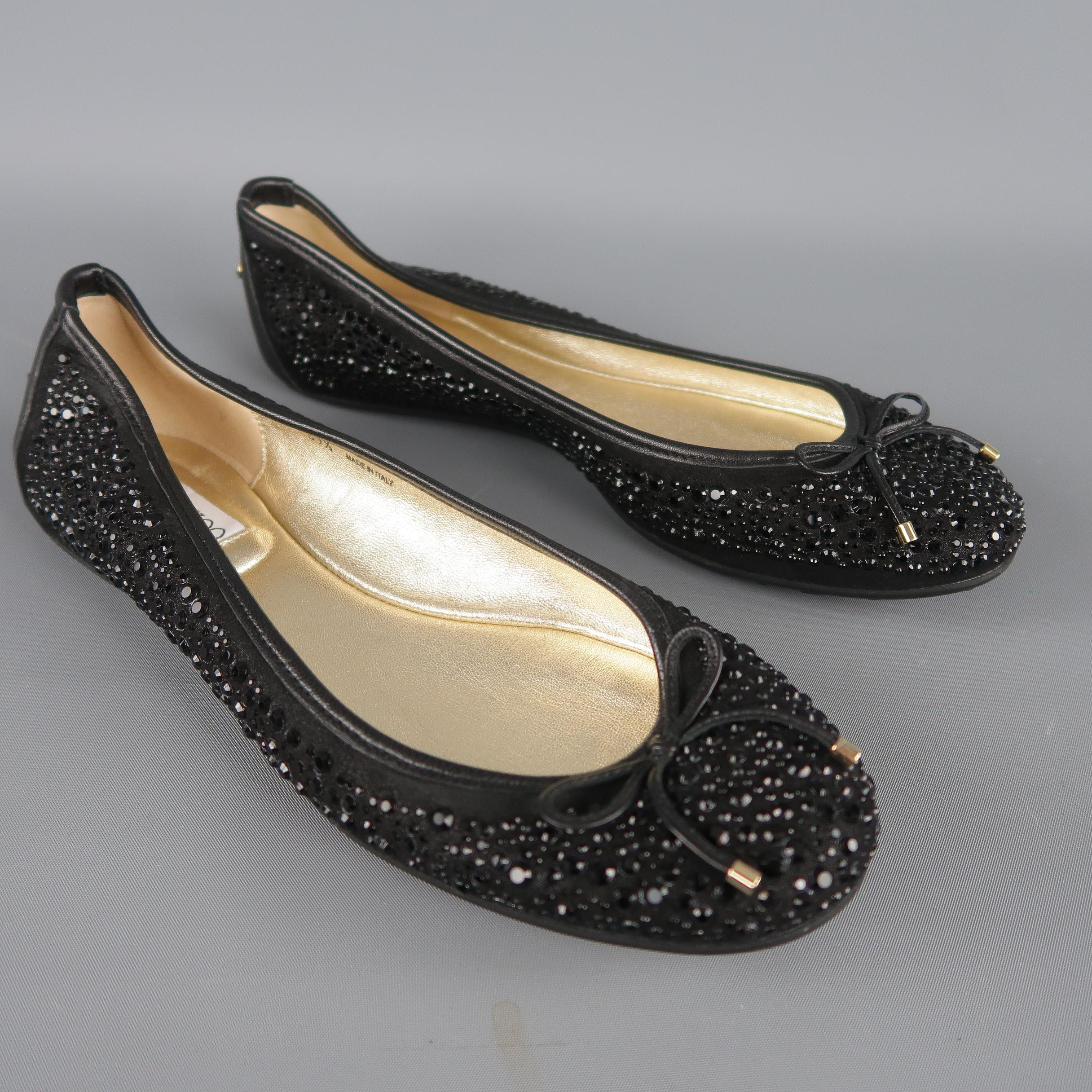 JIMMY CHOO ballet style flats come in black suede with rhinestones throughout, rubber sole, and leather bow detail. Made in Italy. Retail price $795,00.
 
Excellent Pre-Owned Condition.
Marked: IT 39.5
 
10 x 3.5 in.
