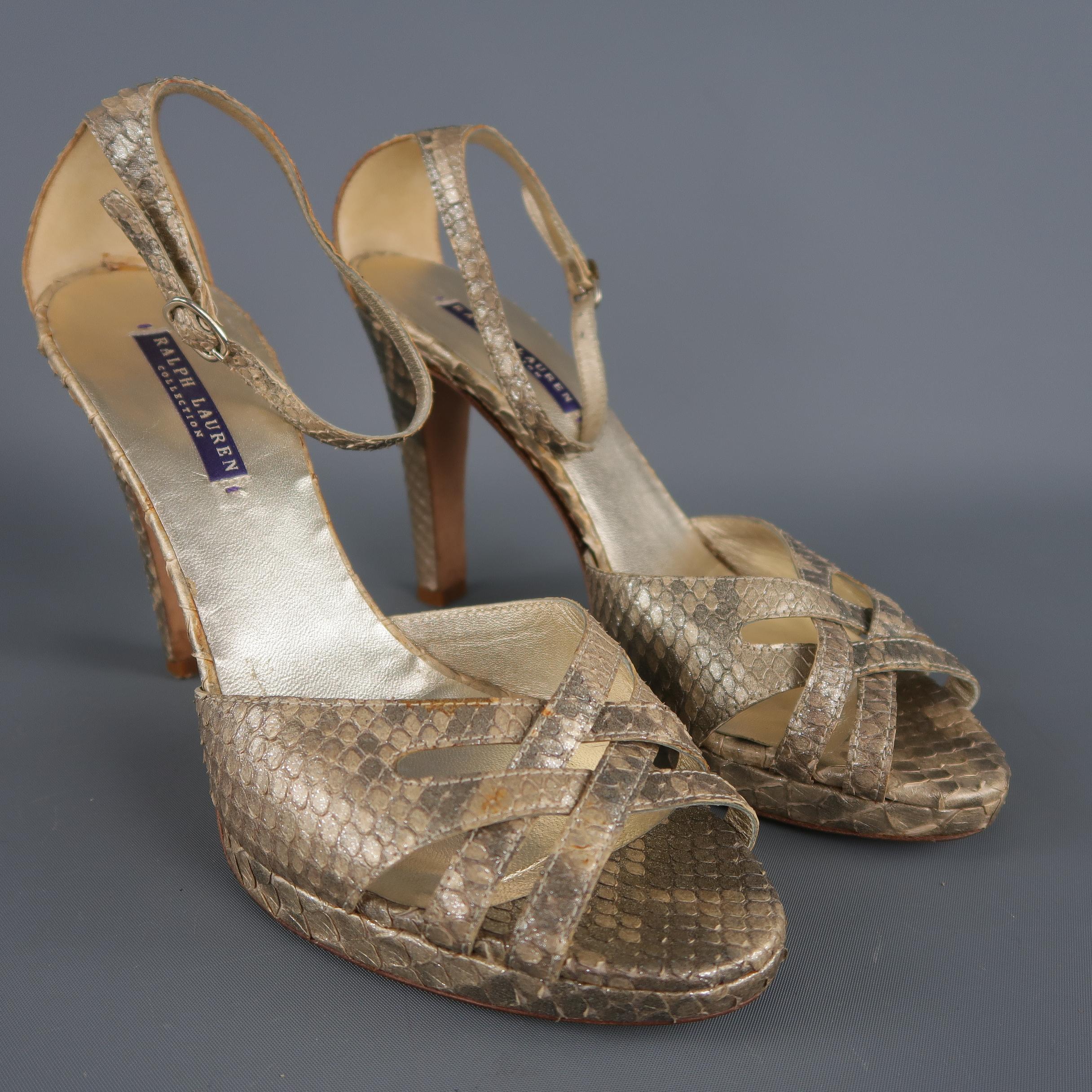 RALPH LAUREN COLLECTION sandals come in sparkly metallic python skin leather with woven toe straps, covered heel and platform, and ankle strap. Wear throughout. As-is. Made in Italy.
 
Good Pre-Owned Condition.
Marked: 9 B
 
Measurements:
 
Heel: