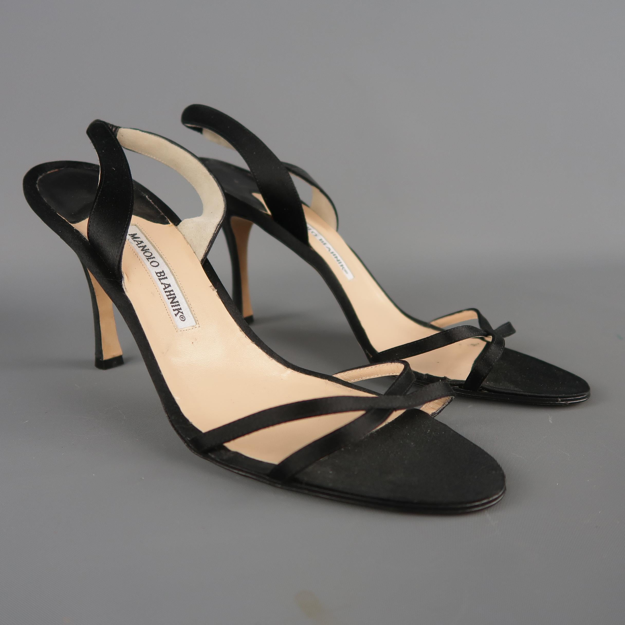 MANOLO BLAHNIK sandals come in black silk satin with a crossed toe strap. covered stiletto heel, and sling back. Never worn. Made in Italy.
 
New without Tags.
Marked: IT 42
 
Measurements:
 
Heel: 4 in.