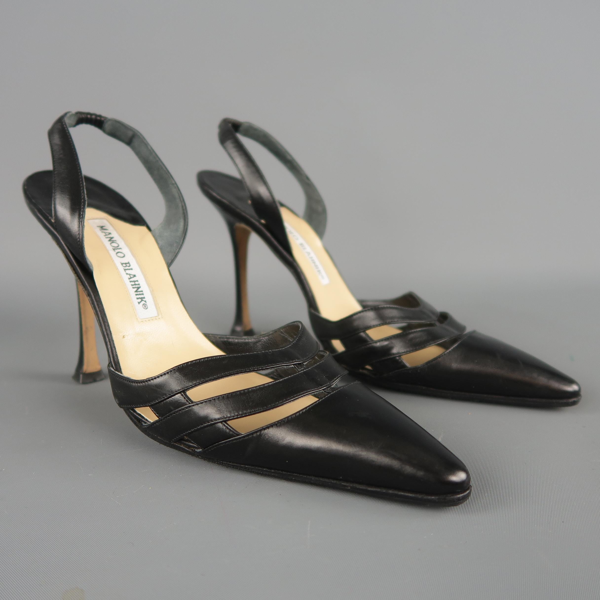 MANOLO BLAHNIK pumps come in black smooth leather with a pointed toe accented with cutouts, covered stiletto heel, and slingback. Made in Italy.
 
Excellent Pre-Owned Condition.
Marked: IT 36.5
 
Measurements:
 
Heel: 4.25 in.