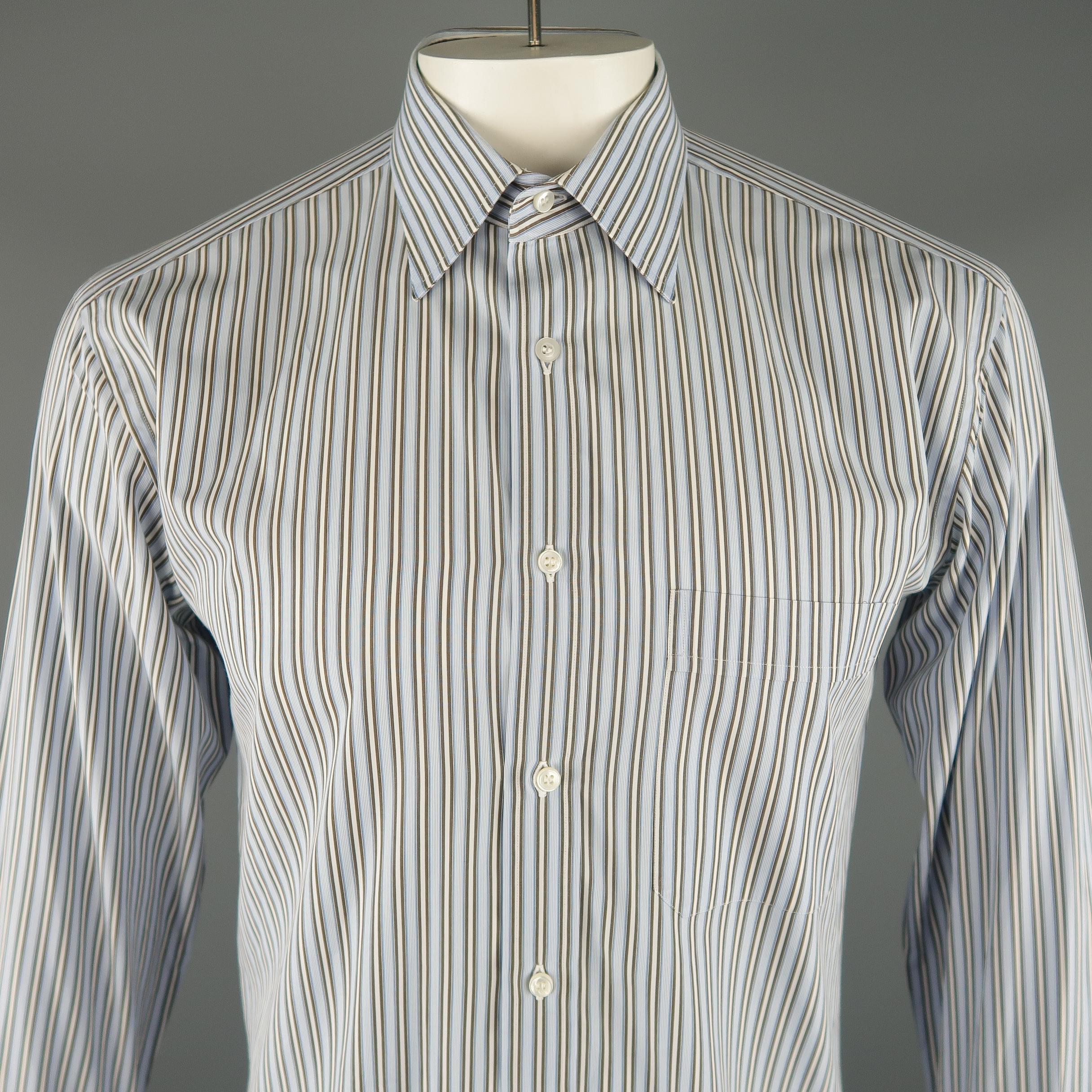 BRIONI classic long sleeve shirt comes in light blue, white and brown tones in striped cotton material, with a front pocket, button up. Made in Italy.
 
Excellent Pre-Owned Condition.
Marked: L  / 16 1/2
 
Measurements:
 
Shoulder: 18 in.
Chest: 45