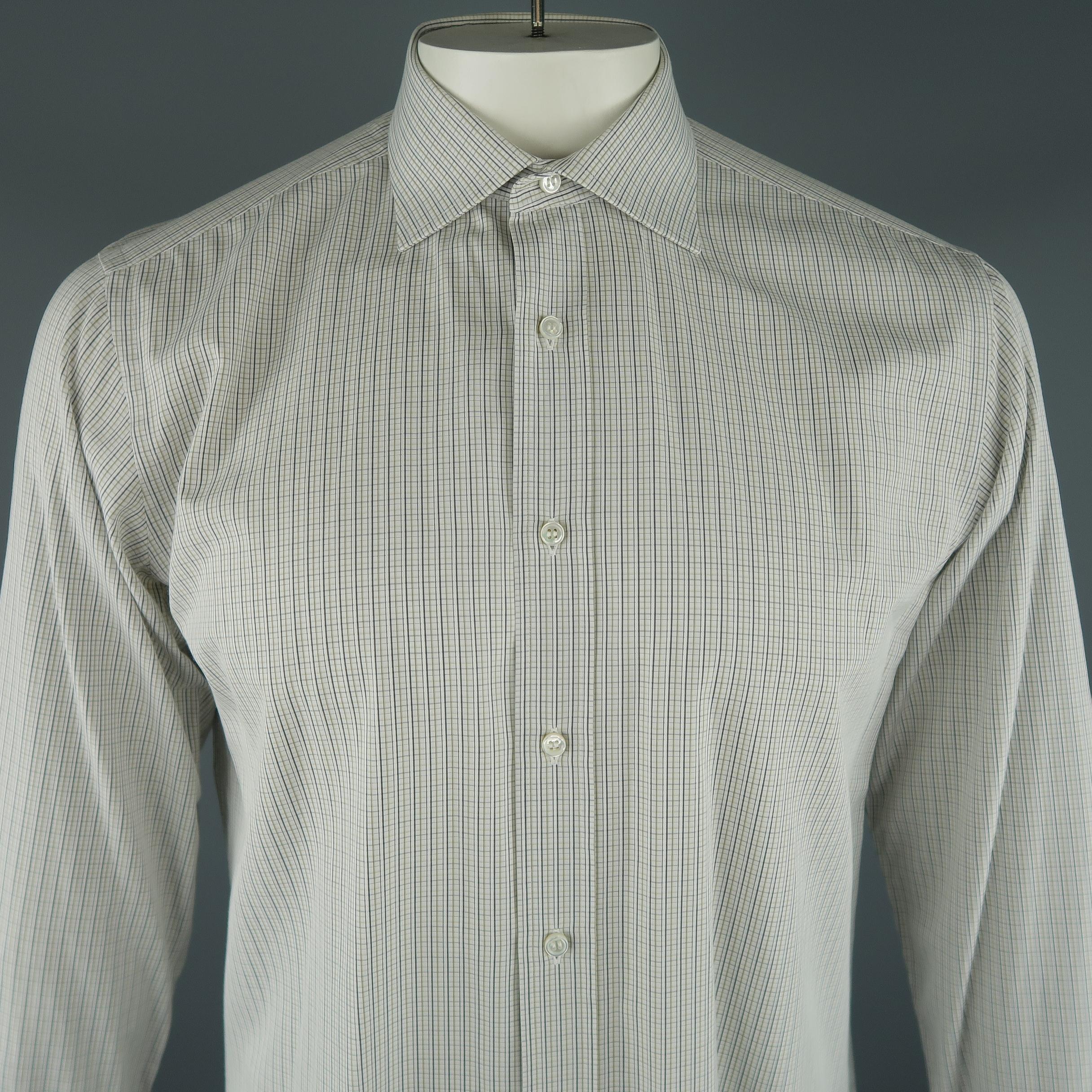 BRIONI long sleeve shirt comes in white tone in window pane cotton material, with a spread collar, button up. Made in Italy.
 
Excellent Pre-Owned Condition.
Marked: 41 / 16
 
Measurements:
 
Shoulder: 16.5 in.
Chest: 46 in.
Sleeve: 25.5 in.
Length: