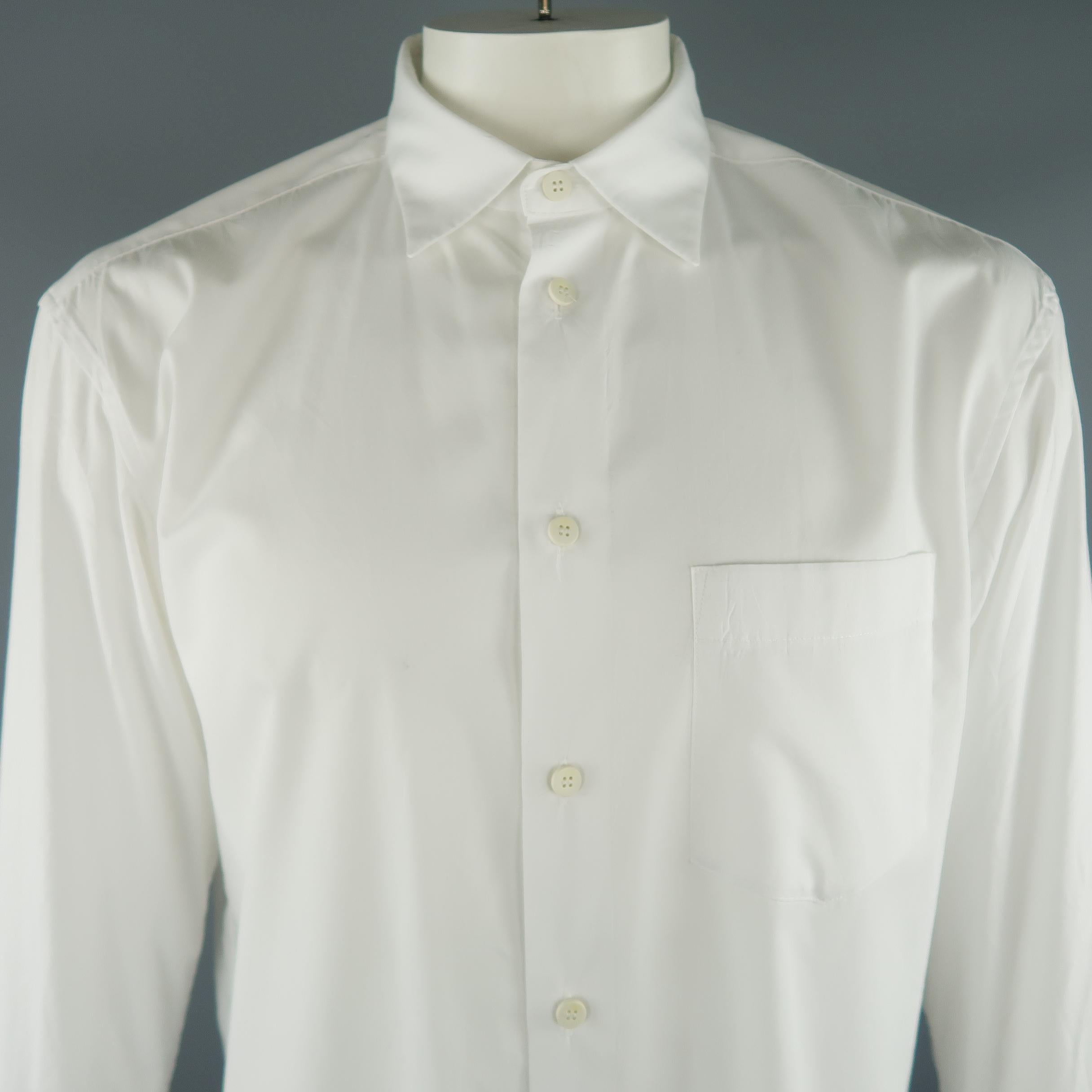 ISSEY MIYAKE long sleeve shirt comes in white tone in polyester / cotton material, with a front pocket, button up. Made in Japan.
 
Excellent Pre-Owned Condition.
Marked: 4 JP
 
Measurements:
 
Shoulder: 20  in.
Chest: 49 in.
Sleeve: 25 in.
Length: