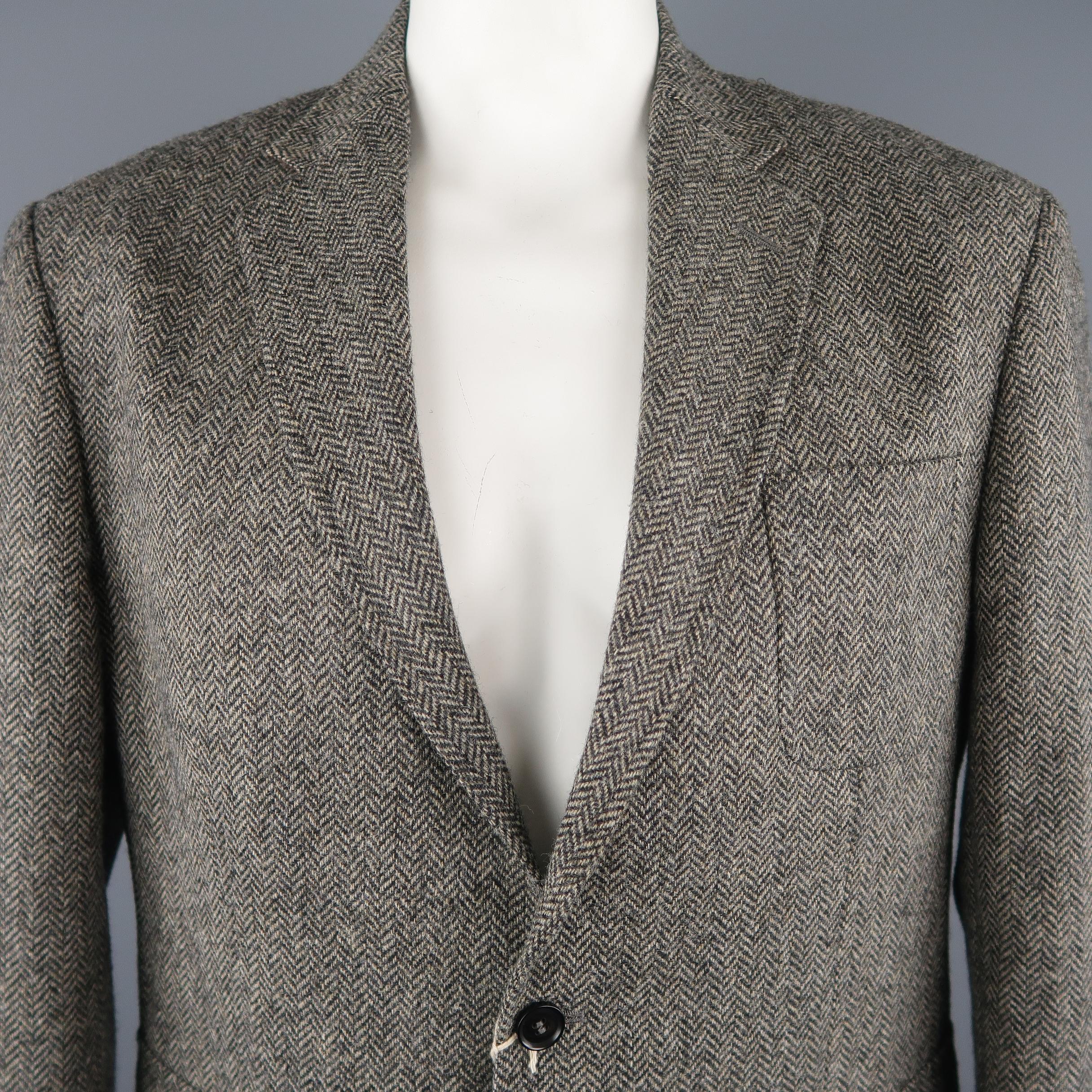 BILLY RED blazer comes in a grey tone in a herringbone wool material, featuring a notch lapel, patch pockets, 2 buttons closure, single breasted and a regular fit. Made in Italy.
 
New With Tags.
Marked: 44R
 
Measurements:
 
Shoulder: 19 in.
Chest: