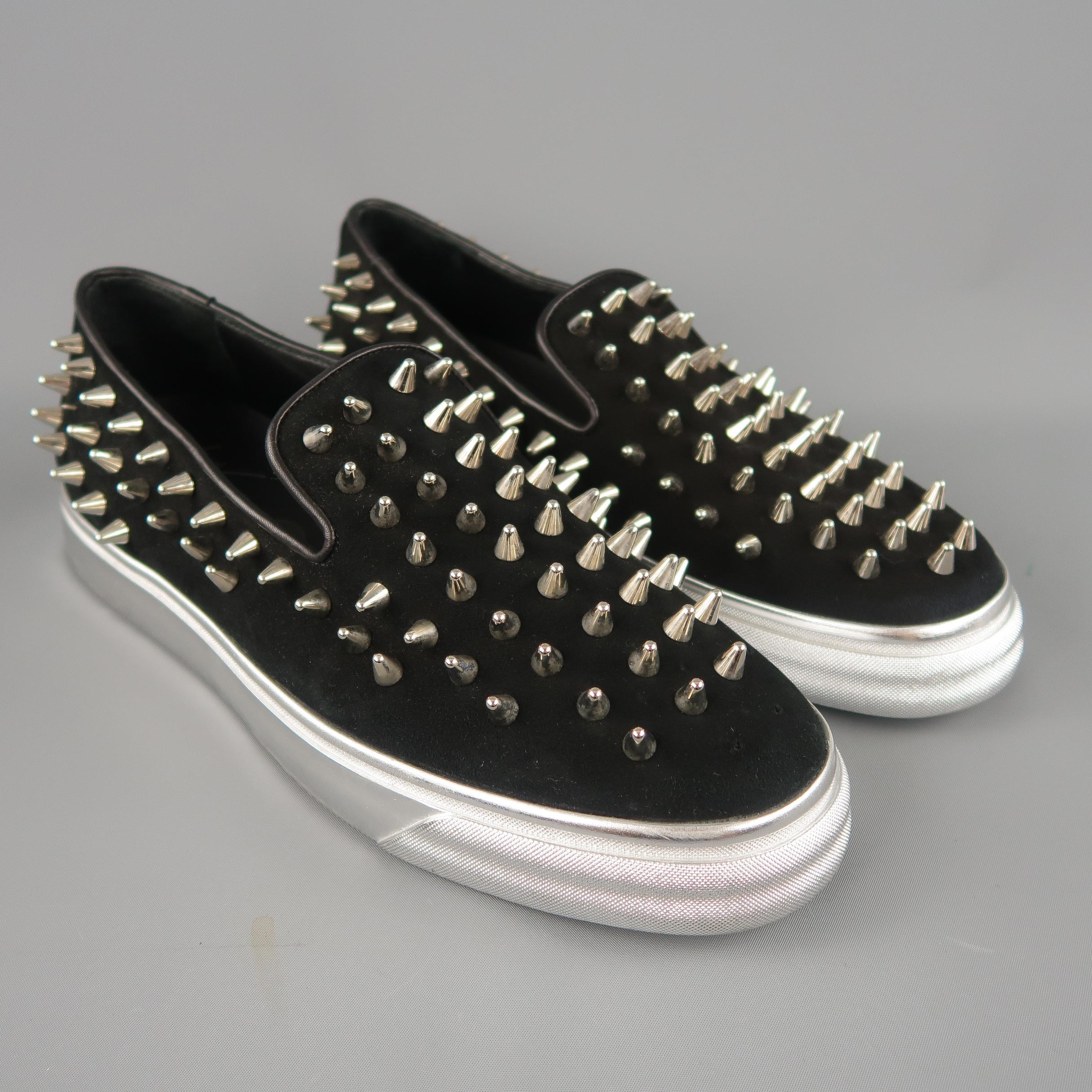 GIUSEPPE ZANOTTI Thorn Studded slip on sneakers come in black suede with silver tone cone spikes throughout and a metallic silver rubber sole. Right Shoe Missing a couple spikes on toe. As-is. Made in Italy.
 
Excellent Pre-Owned Condition.
Marked: