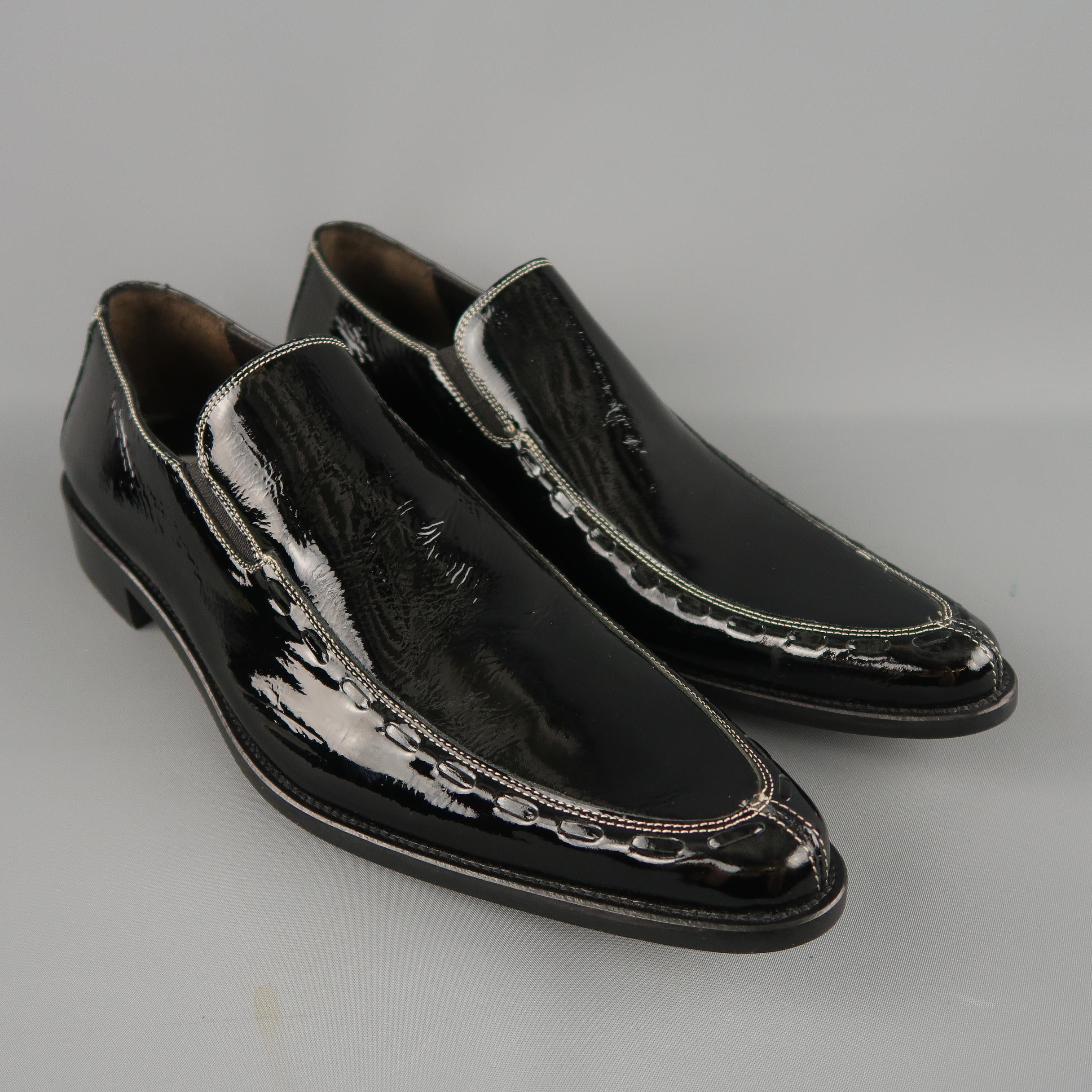 DONALD J PLINER dress loafers come in black patent leather with contrast stitch apron pointed toe, heeled sole, and whipstitch detail. Made in Italy.
 
New without Tags.
Marked: 10 M
 
Outsole: 13 x 4.5 in.