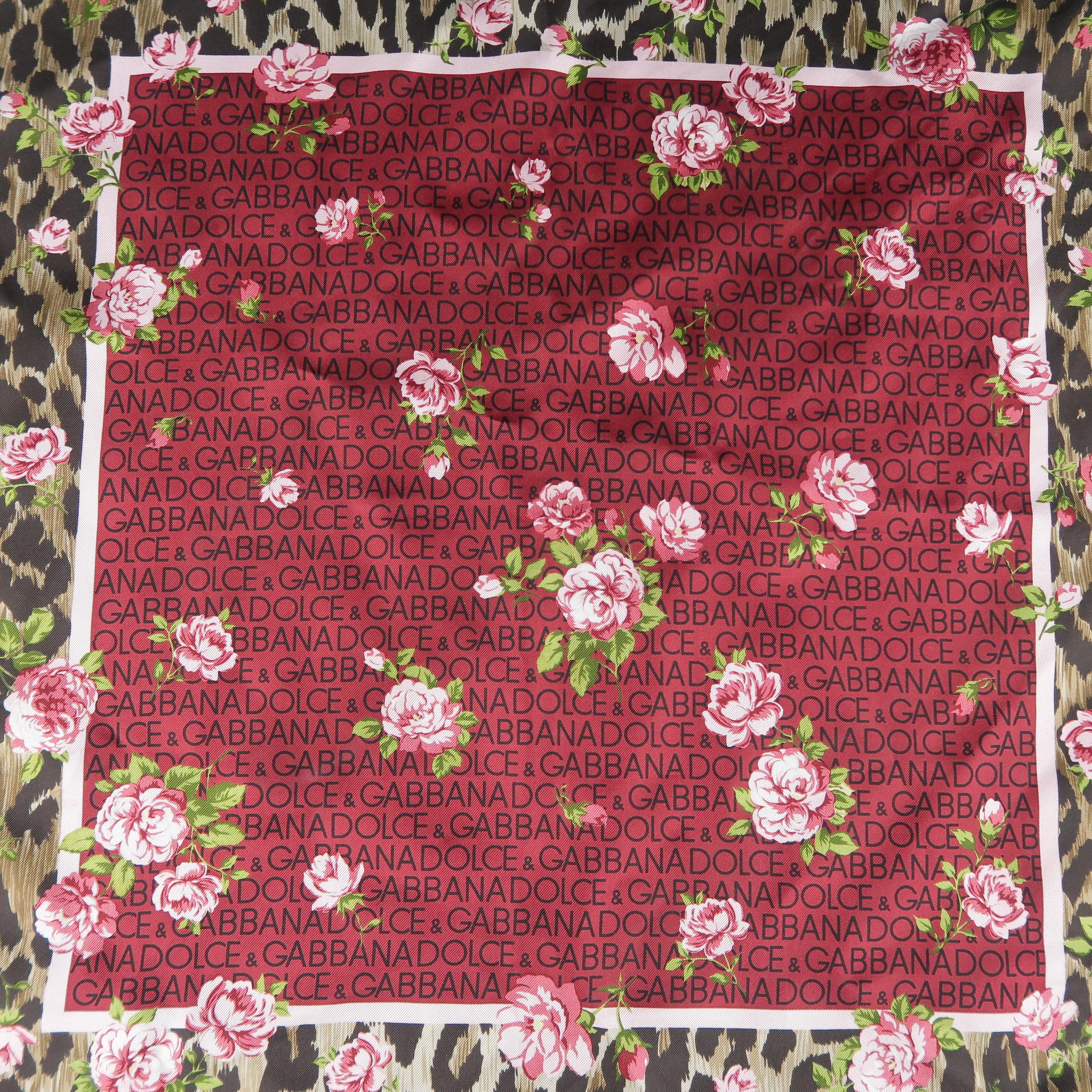 DOLCE & GABBANA scarf comes in silk twill with a burgundy logo print with leopard print boarder and floral overlay. Made in Italy.
 
New with Tags.
 
18.5 x 19 in.
 
SKU: 92948
