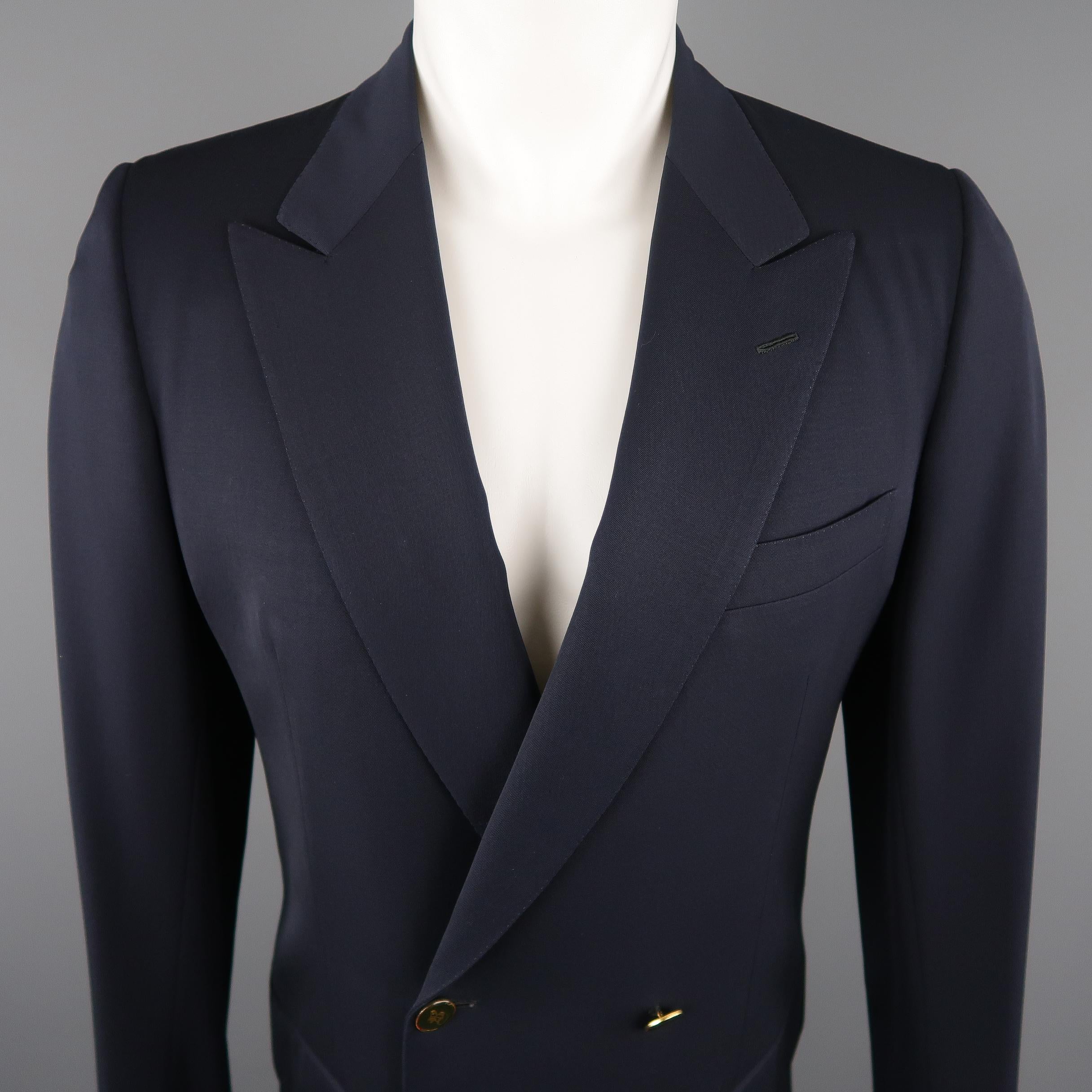 BRIONI classic blazer comes in a navy tone in a solid wool material, featuring a peak lapel, slit and flap pockets, double breasted and with a double vent at back. Made in Italy.
 
Excellent Pre-Owned Condition.
Marked: 48 IT
 
Measurements:
