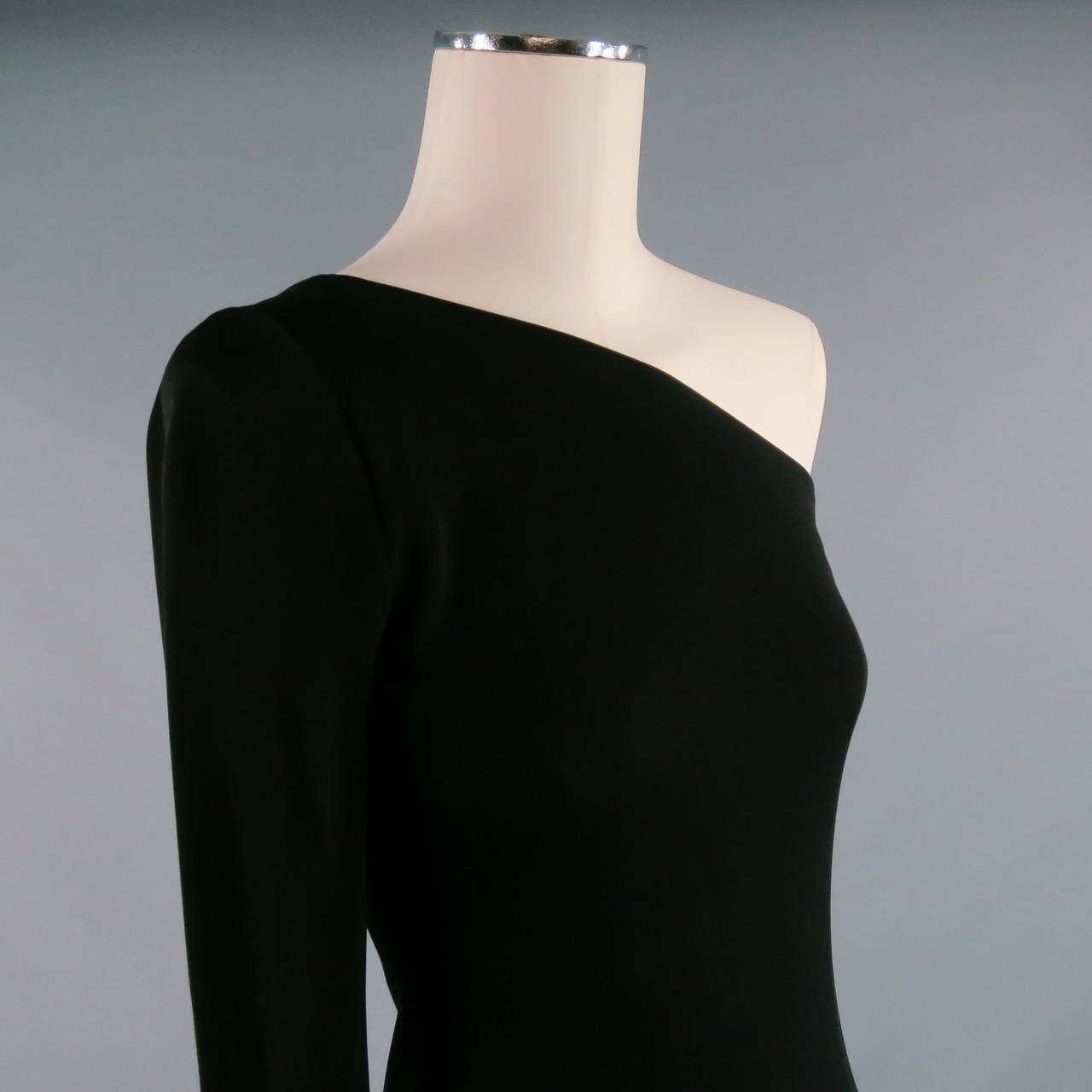 Amazing Collection by RALPH LAUREN dress, full length in a black viscose jersey.  Sleek one shoulder, one long sleeve design with a flattering diagonal at neckline, front and back.  Fully lined, side zip invisible closure.  Made in USA.
