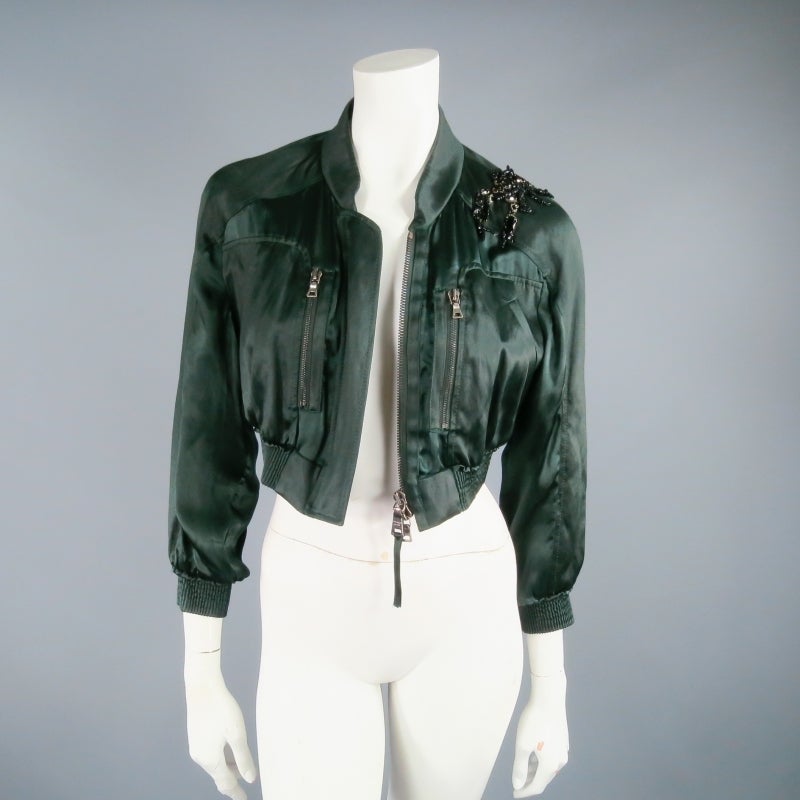 Gorgeous emerald green cropped bomber jacket by PRADA. In the style of a classic MA1 utility jacket, this piece has a glamourous 
