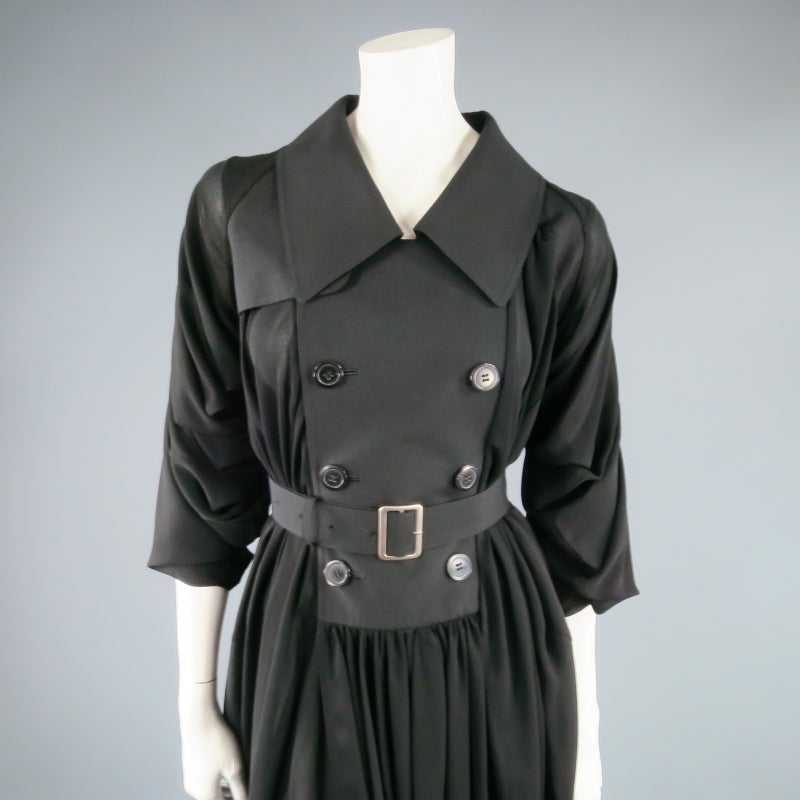 Fabulous belted coat dress by COMME DES GARCONS Junya Watanabe. A classic trench coat reworked into an avant garde masterpiece, this style comes in sheer draped chiffon with wool panels., featuring a double breasted button closure, over sized