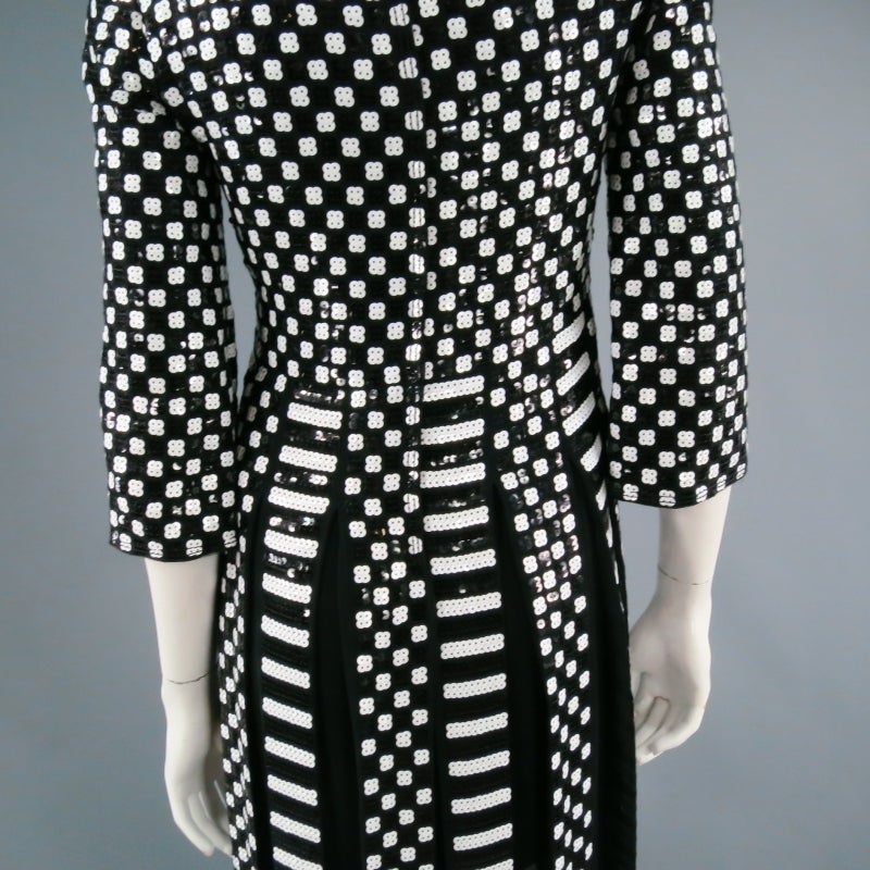 Fabulous 1960's Mod inspired evening gown by MARC JACOBS. Look 23 from  Spring/Summer 2013 Collection, this dazzling number comes in graphic black and white sequin checkered and stripe print and features a boat neck, 3/4 sleeve, and thick fringe