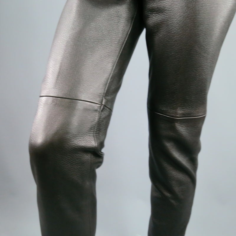 Fabulous vintage CHANEL leather pants. A fitted, high rise style in soft pebbled textured leather, fully lined, with belt loops, featuring a silver tone 