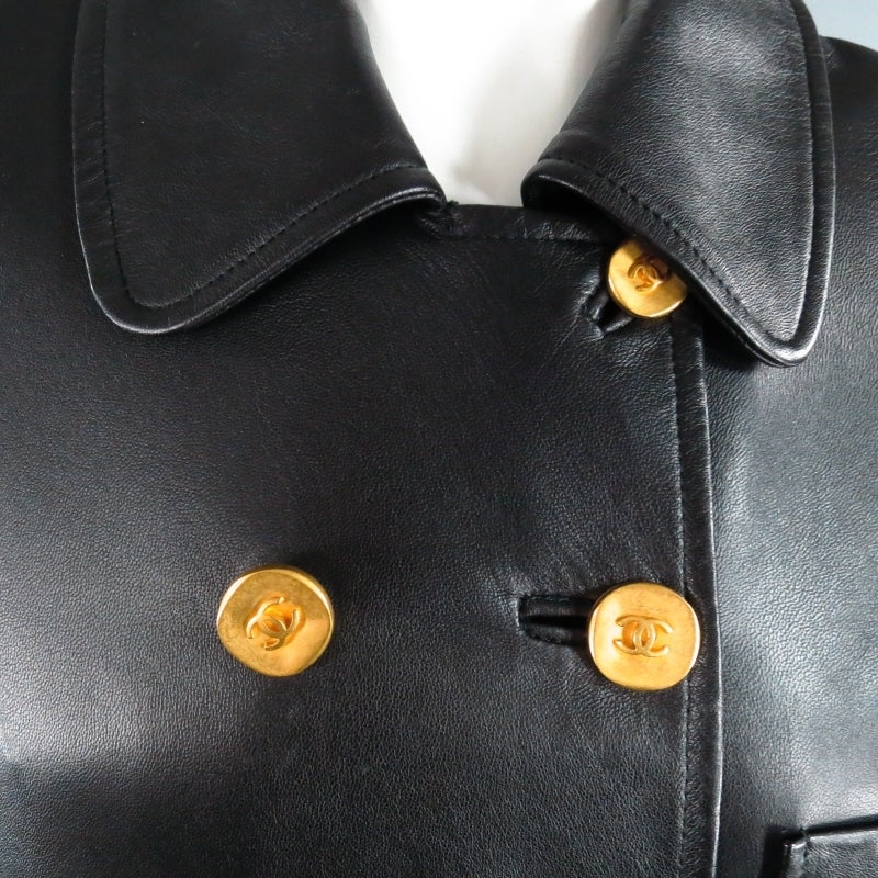 Fabulous vintage full length double breasted leather coat by CHANEL. An iconic piece from the archives perfect for the modern fashionista, this style comes in soft black Cuir (boiled) leather and features a classic collar, breast patch pocket,