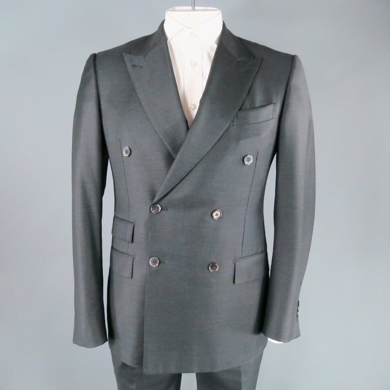 Unbelievable double-breasted, dark charcoal  light weight wool suit by Ermenegildo Zegna. This timeless master-crafted piece comes in a light gauge, dark charcoal wool fabric .  This suit is equipped for nighttime events... the  jacket is double