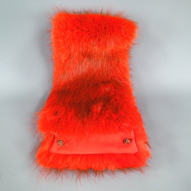 Fabulous colored orange beaver fur collar by SPORTMAX. An ultra chic style perfect for adding some color to your Fall/Winter wardrobe, this piece comes in a rectangular shape with double snap closure for multi purpose wear. Looks great as a high