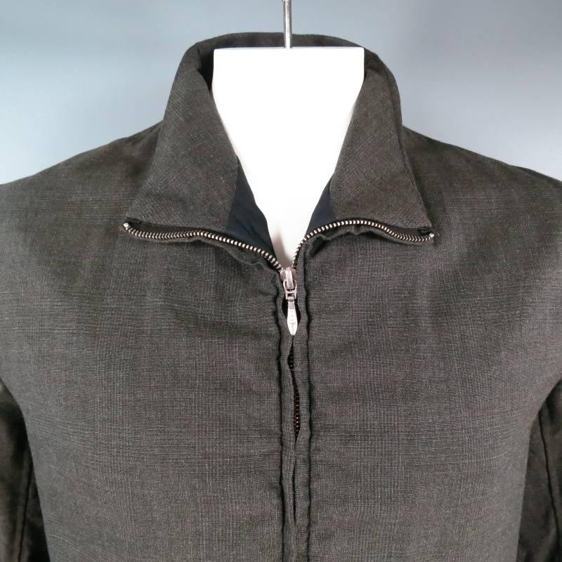 Einzigartige Jacke mit Reißverschluss von PAUL HARNDEN. Dieses Modell ist aus leichtem Glenplaid-Wollstoff gefertigt und verfügt über schräge Reißverschlusstaschen:: einen nahtlosen Reißverschlusskragen:: einen doppelt spitzen Saum und eine