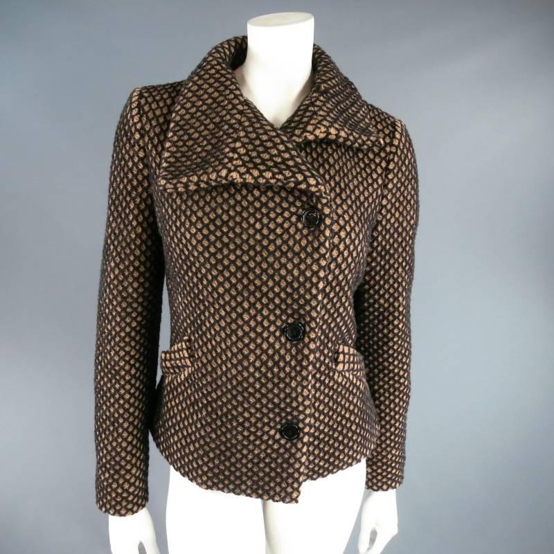 Fabulous RED LABEL by VIVIENNE WESTWOOD winter jacket. This revamped classic comes in a thick tan wool blend with black mesh texture and features an asymmetrical collar and button closure, frontal pockets, and unique asymmetrical back pleating for a