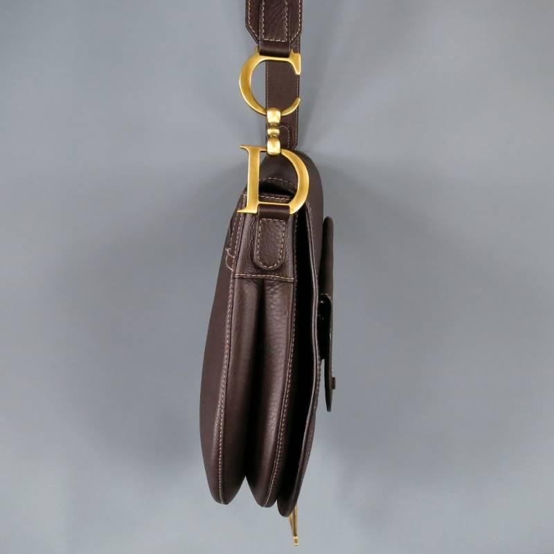 saddle shaped handbag