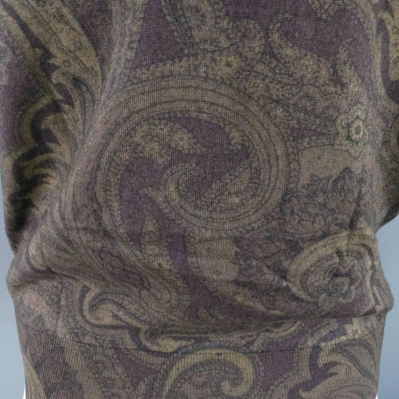 Light weight sweater vest by Etro. This modern take on a classic style comes in a gorgeous high quality earth tone paisley print wool silk knit and features a deep V neck, micro ribbed waist and sleeve bands, and abalone textured Etro buttons. Made