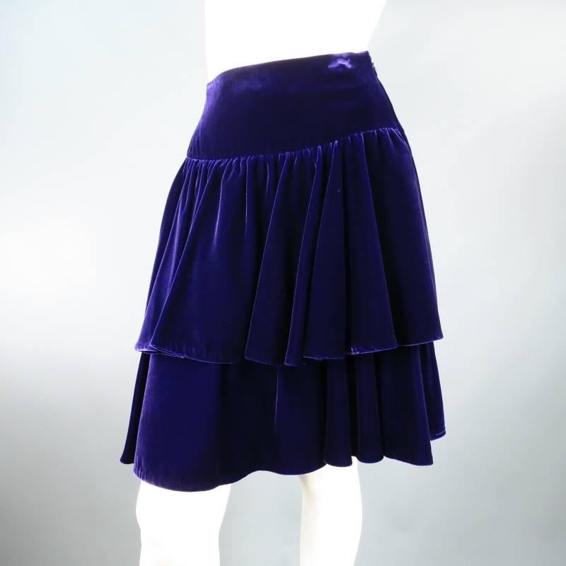 This gorgeous dress skirt by RALPH LAUREN comes in a rich purple viscose velvet and features a hidden side zip closure, thick waist band, and 2 layers of gathered ruffle with excellent movement. Perfect for winter and holiday events. The velvet