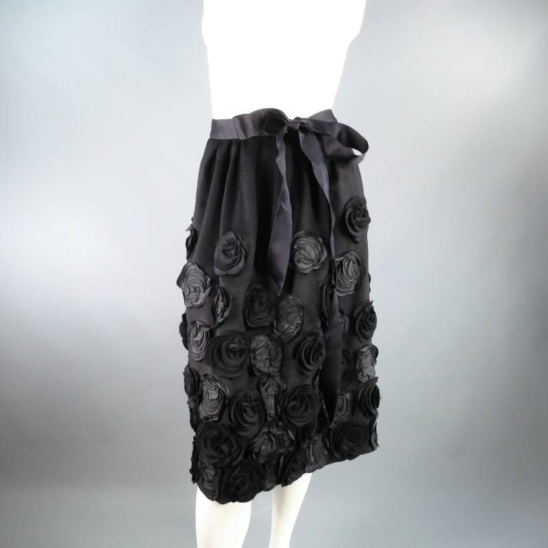 Fabulous Fall Winter 2006 Collection skirt by OSCAR DE LA RENTA. This unique piece comes in a soft structured wool Angora blend with velvety texture and features a pleated waist, satin ribbon bow waist band, bubble pencil silhouette, and beautiful