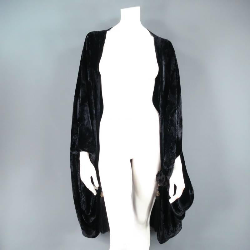 Gorgeous drape shawl by VENETIA STUDIUM. This very rare archive piece comes in a soft brush stroke textured velvet that gathers at both ends with intricate ruffled end pieces topped off with gold tone gothic style tassels. Wear it draped over the