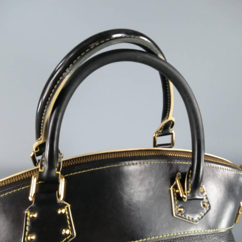 Gorgeous top handles Cuir Suhali handbag by LOUIS VUITTON. This rare style from 2007 features a mix of pebbled and smooth black leather with yellow contrast stitching and features yellow gold tone hardware with cone stud details, zipper tab with LV