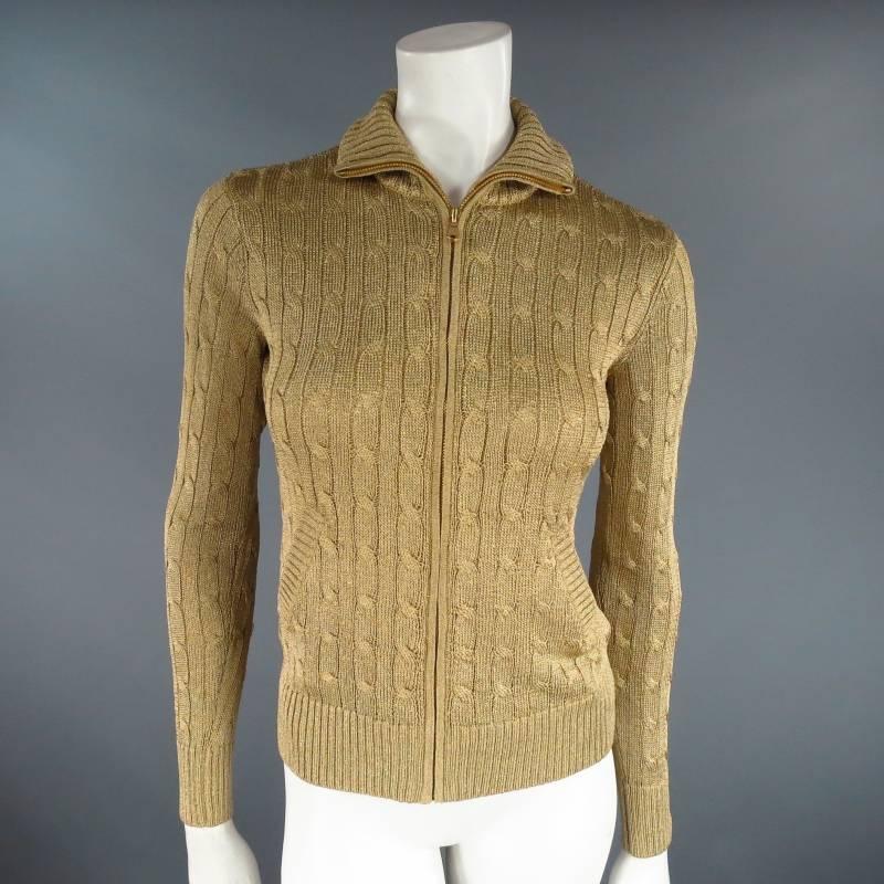 Fabulous BLACK LABEL by RALPH LAUREN sweater jacket. This style comes in a metallic gold sparkle Lurex cable knit and features a tall collar, frontal pockets, ribbed bands, and 